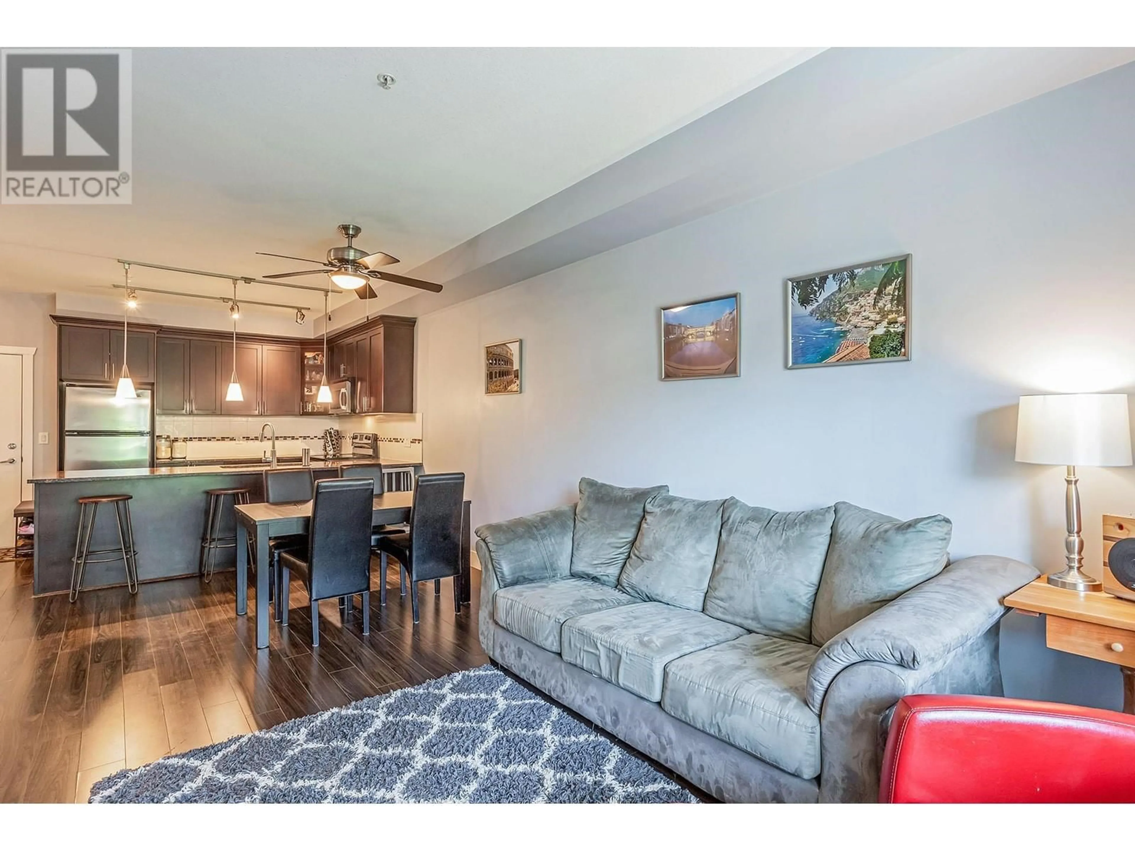 Living room with furniture, wood/laminate floor for 309 - 2330 SHAUGHNESSY STREET, Port Coquitlam British Columbia V5C0B5