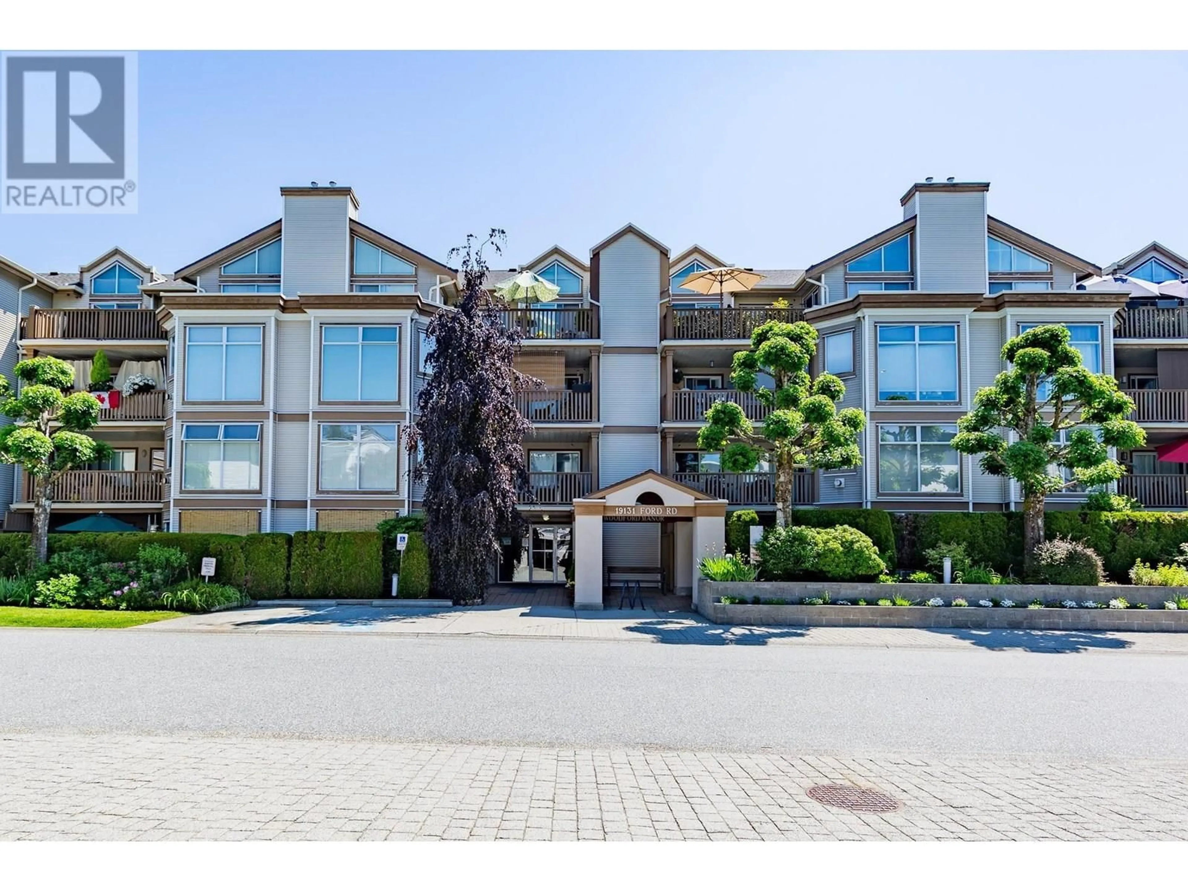 A pic from outside/outdoor area/front of a property/back of a property/a pic from drone, street for 104 - 19131 FORD ROAD, Pitt Meadows British Columbia V3Y2R5