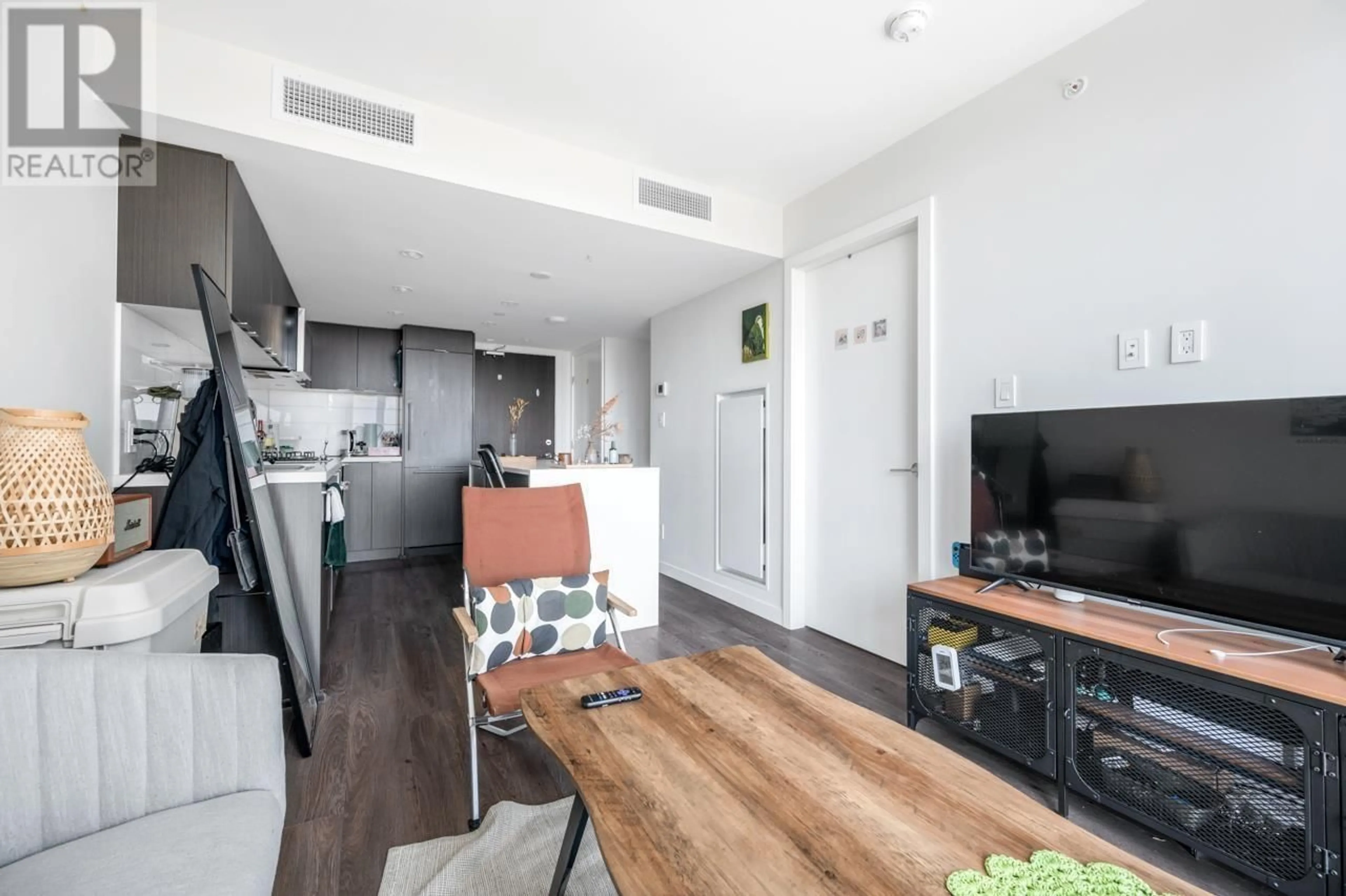 Open concept kitchen, wood/laminate floor for 408 - 8238 LORD STREET, Vancouver British Columbia V6P0G7