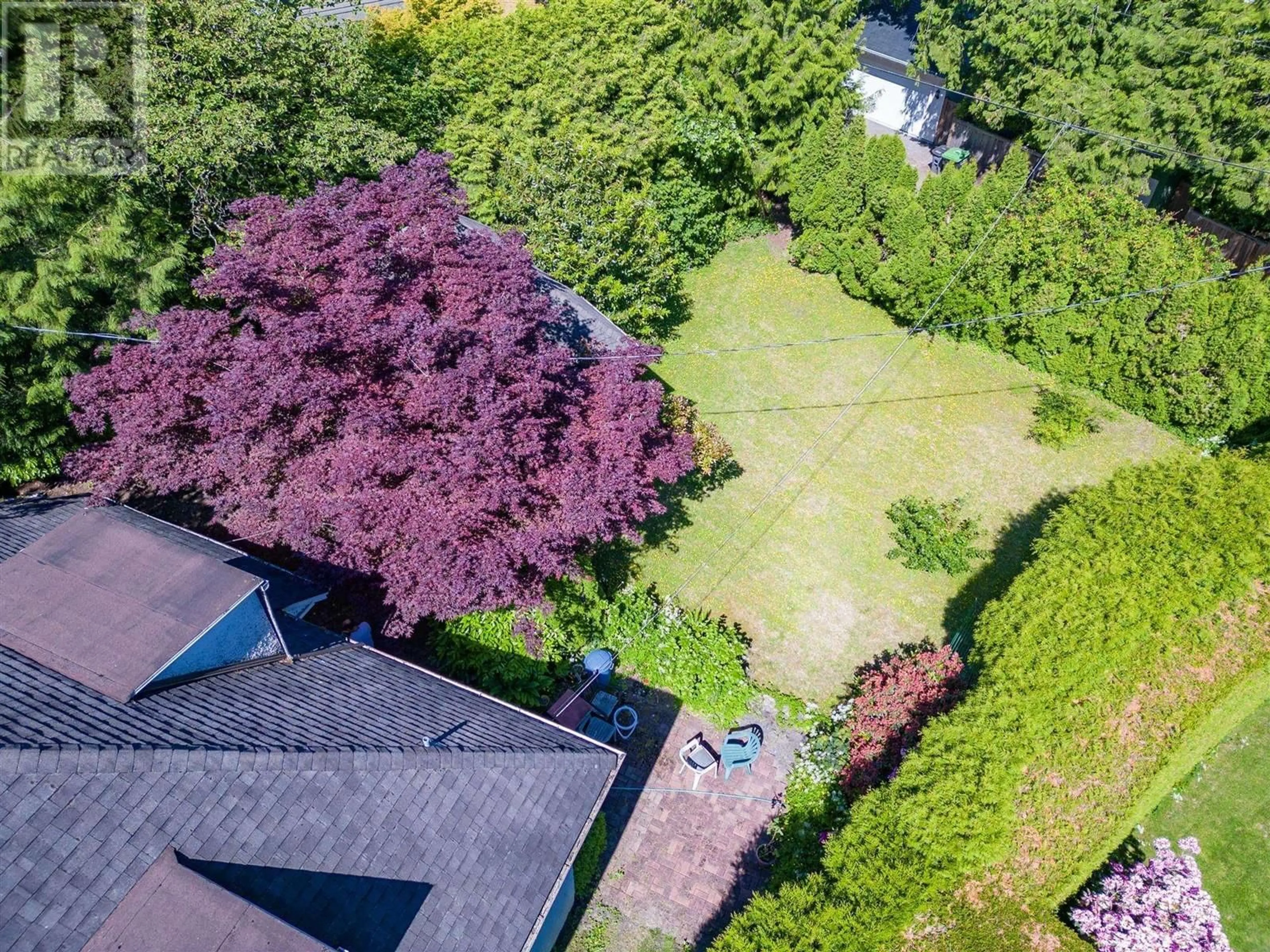 A pic from outside/outdoor area/front of a property/back of a property/a pic from drone, forest/trees view for 5549 CHURCHILL STREET, Vancouver British Columbia V6M3G8