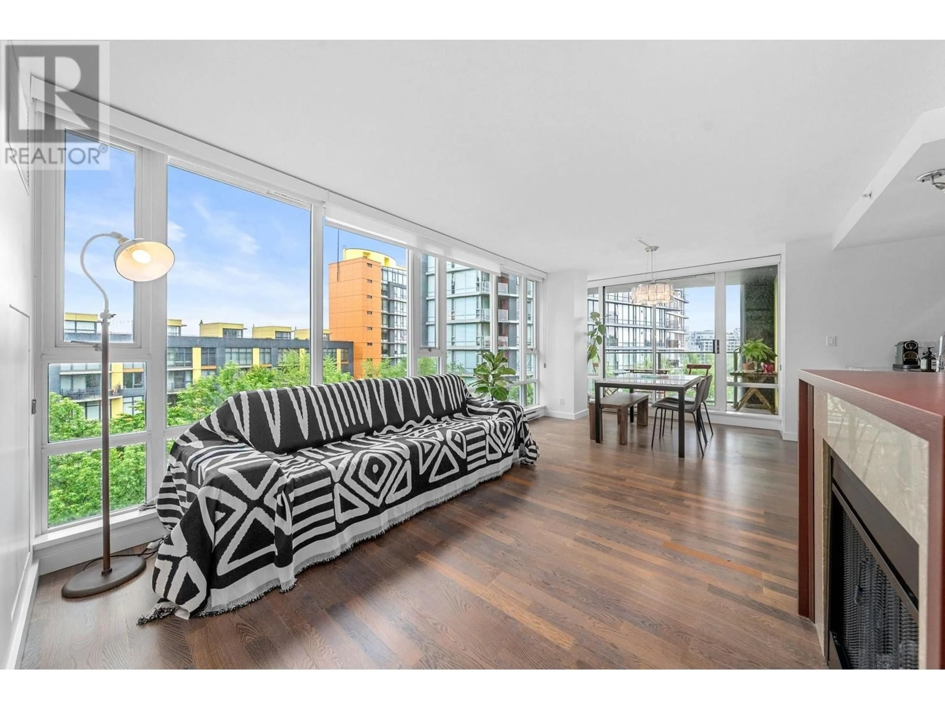 Living room with furniture, unknown for 702 - 918 COOPERAGE WAY, Vancouver British Columbia V6B0A7