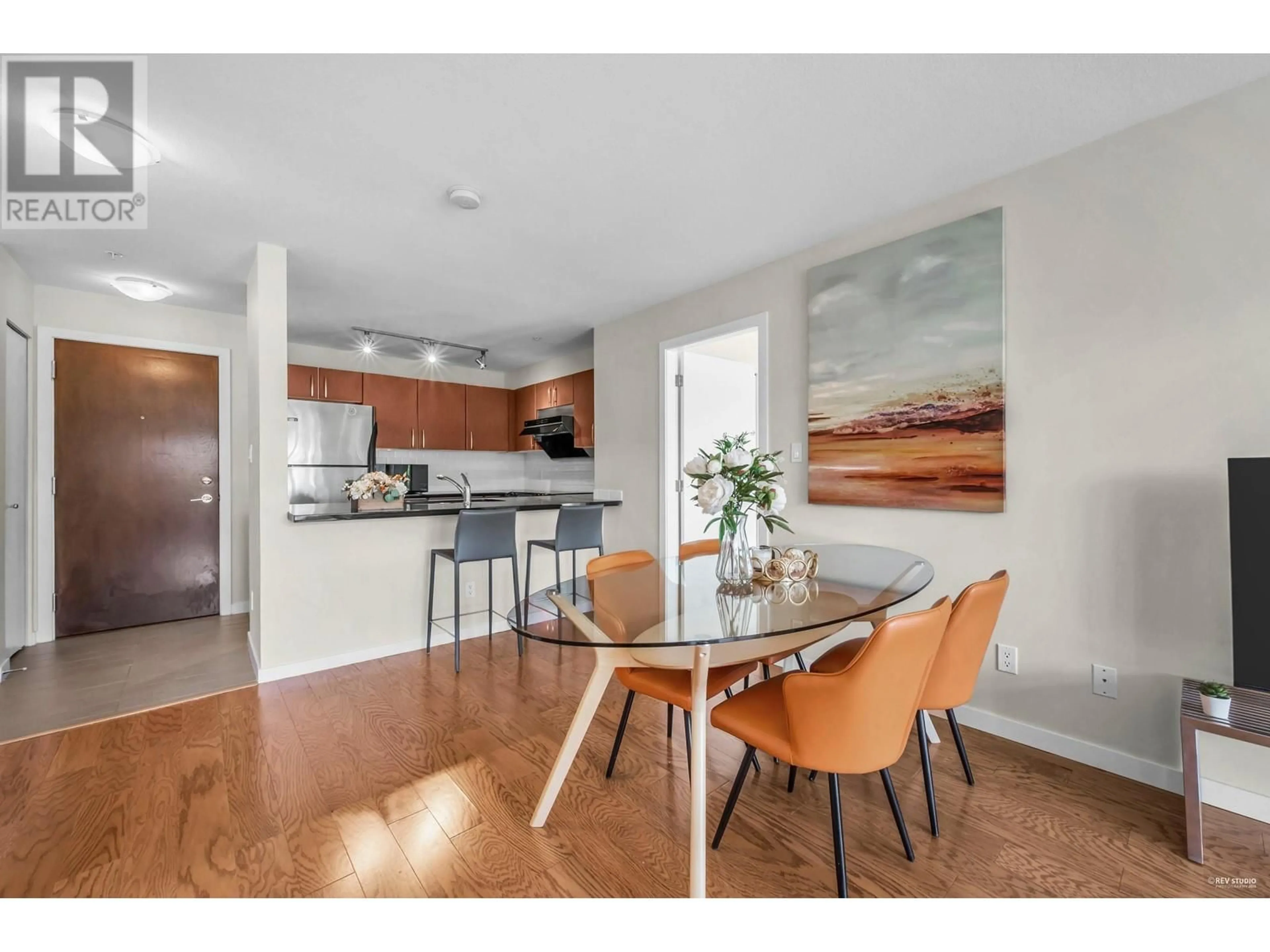 Open concept kitchen, wood/laminate floor for 302 - 7339 MACPHERSON AVENUE, Burnaby British Columbia V5J0B1