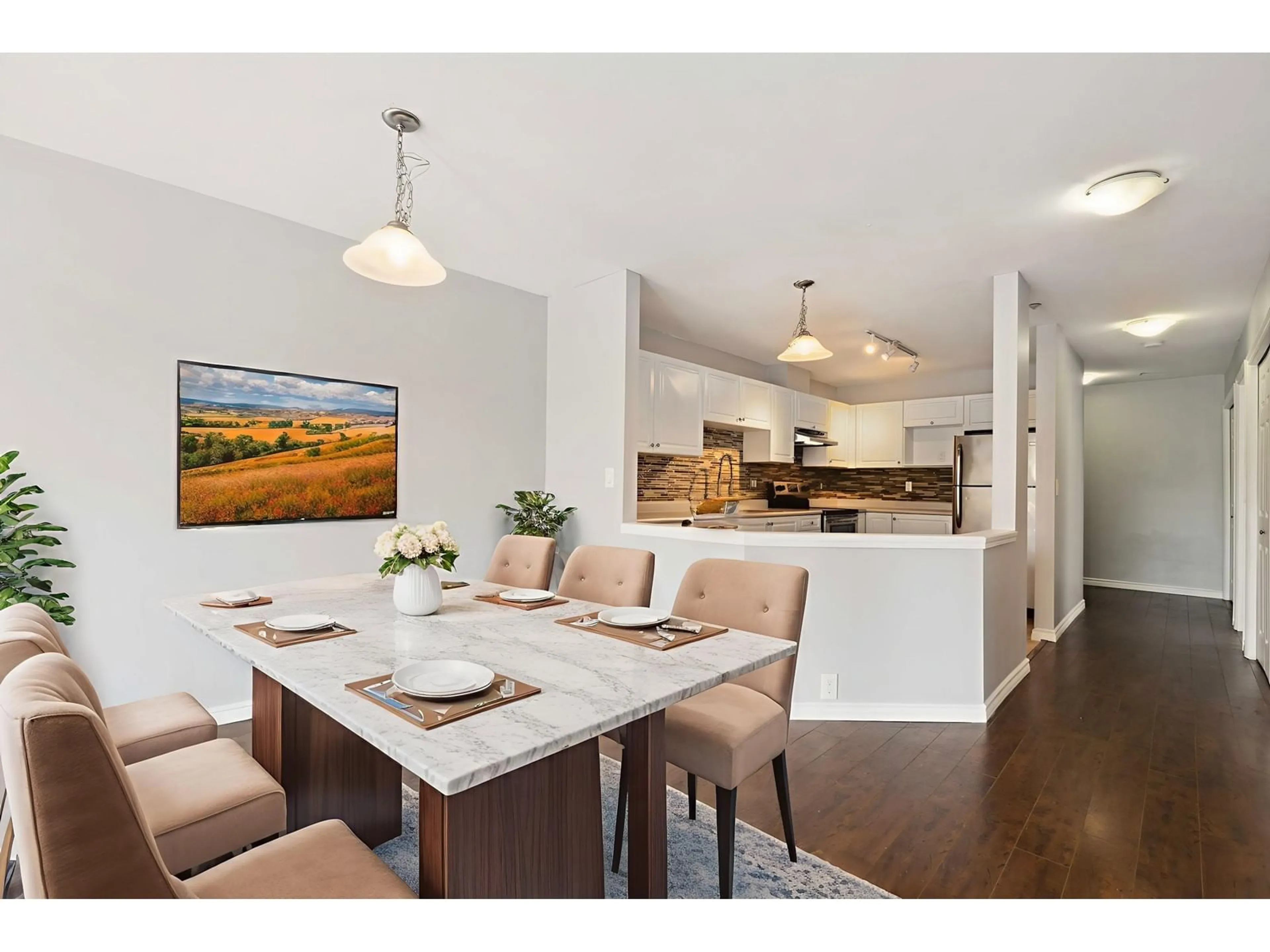 Open concept kitchen, wood/laminate floor for 303 - 5499 203, Langley British Columbia V3A1W1
