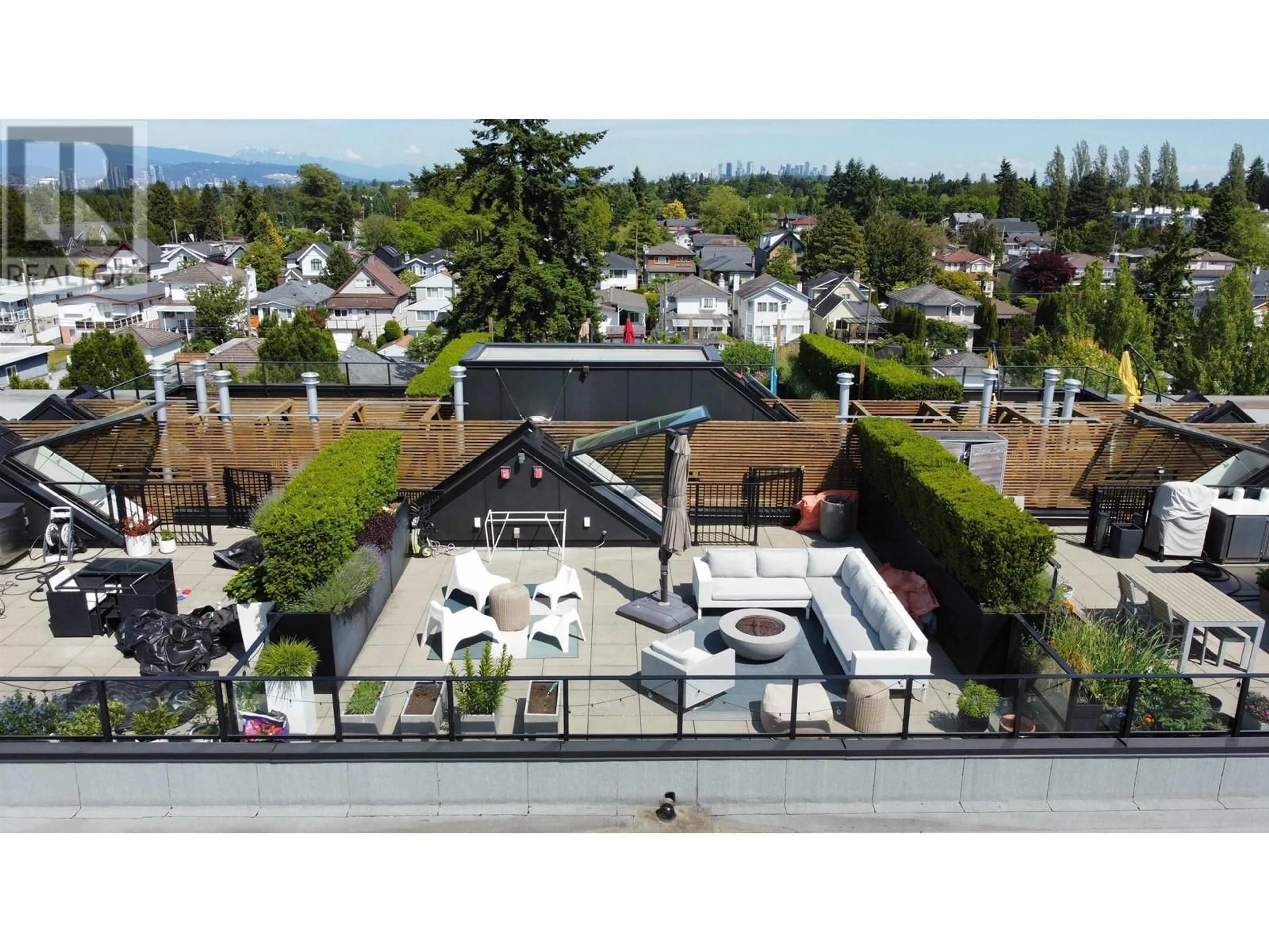 A pic from outside/outdoor area/front of a property/back of a property/a pic from drone, mountain view for 605 - 5085 MAIN STREET, Vancouver British Columbia V5W2R2