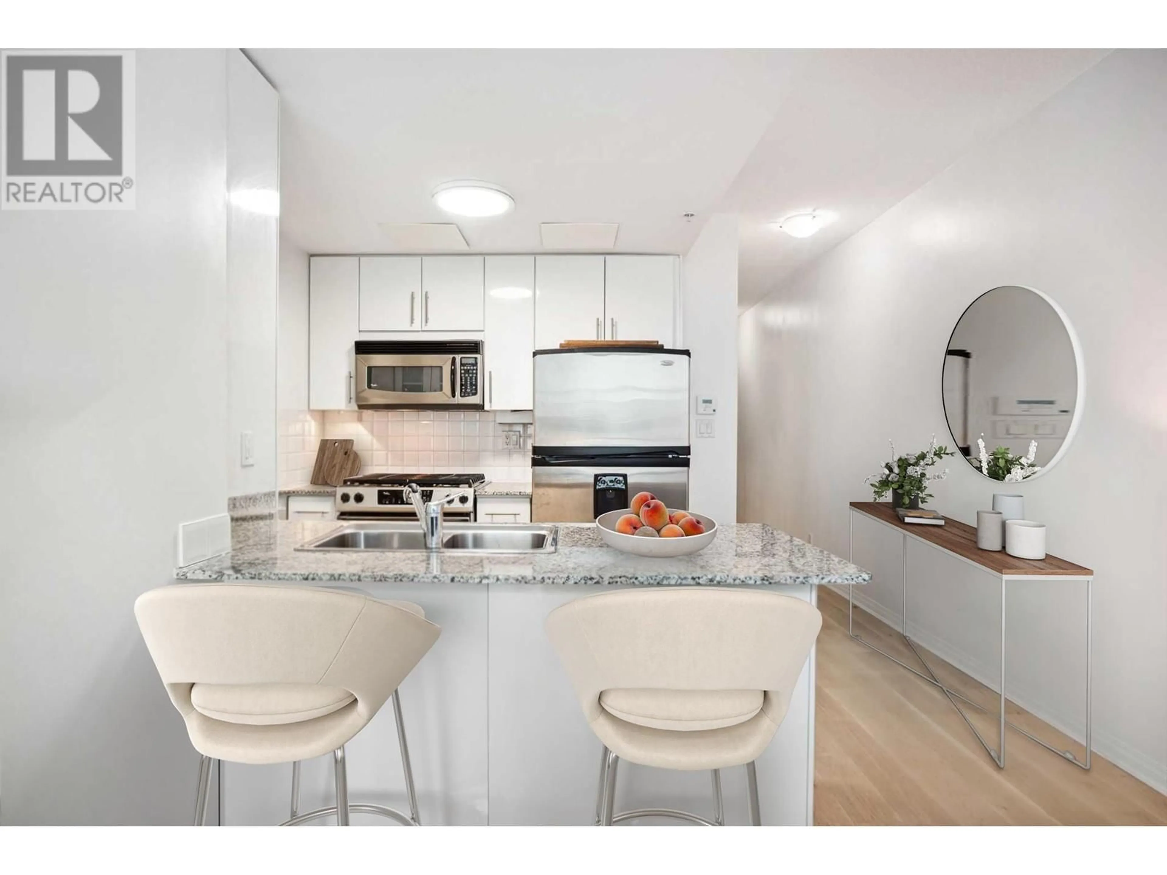 Open concept kitchen, ceramic/tile floor for 603 - 168 ESPLANADE, North Vancouver British Columbia V7L4X8
