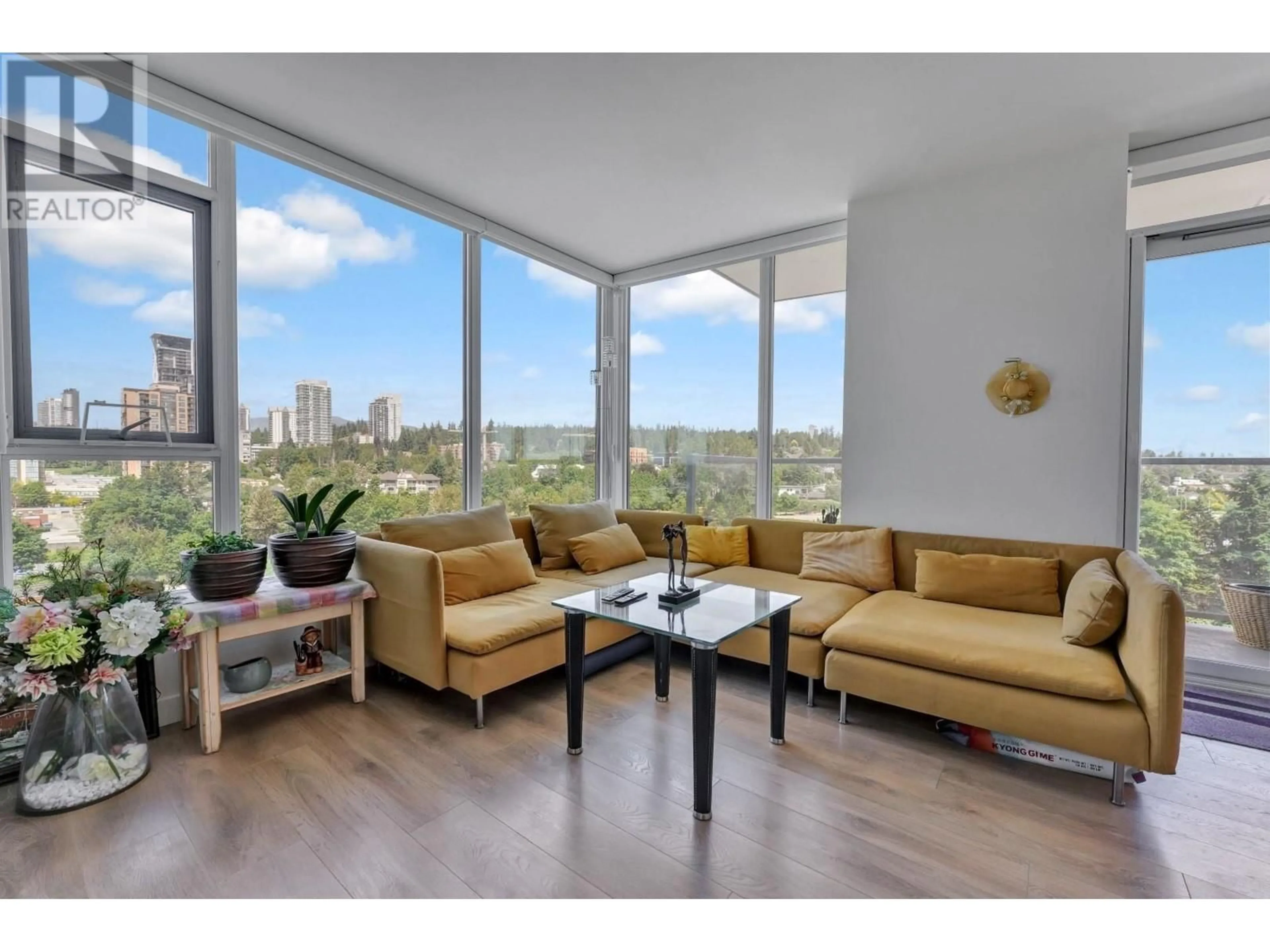 Living room with furniture, wood/laminate floor for 1102 - 318 ALDERSON AVENUE, Coquitlam British Columbia V3K0J1