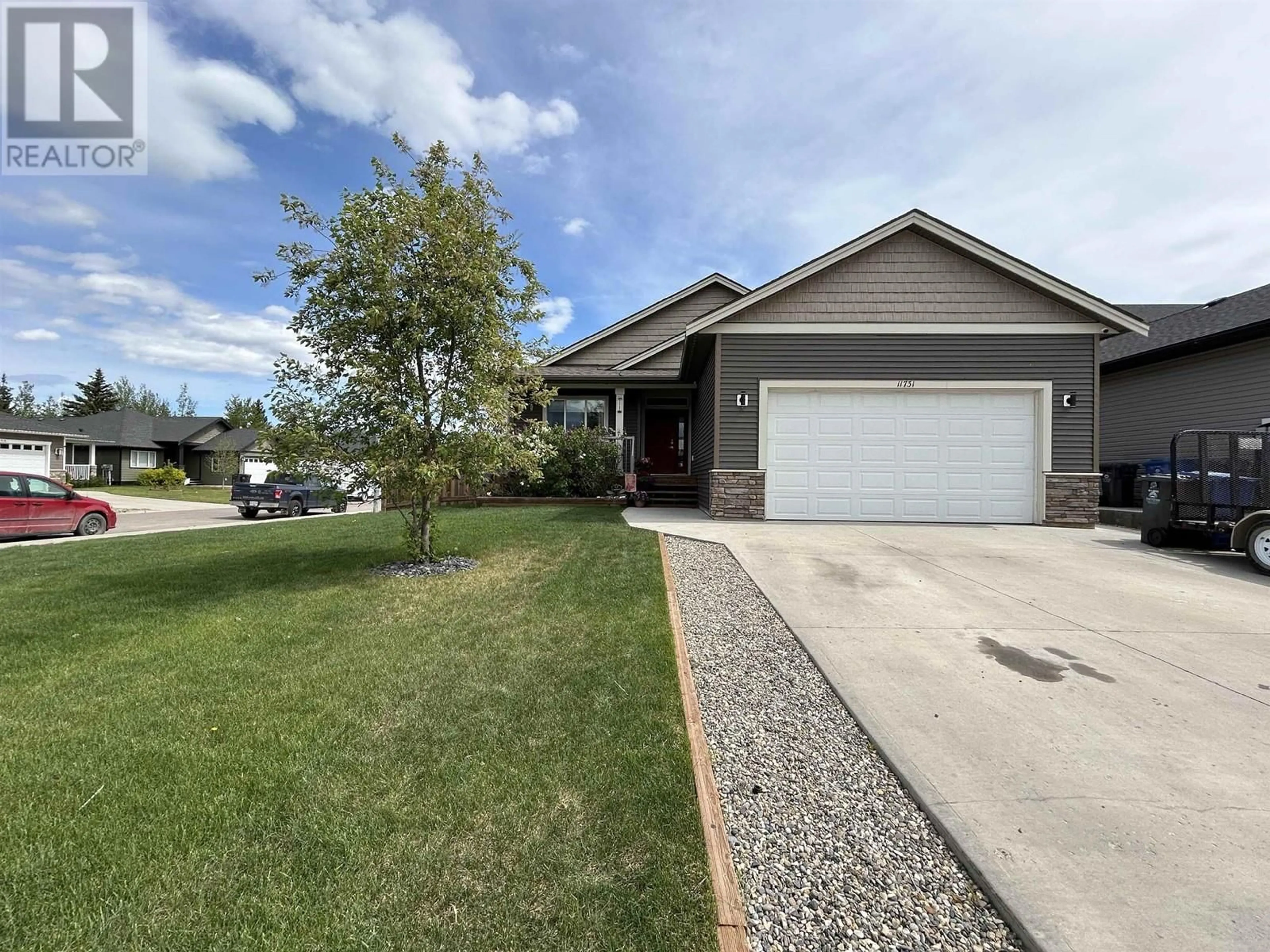 Home with vinyl exterior material, street for 11731 103A STREET, Fort St. John British Columbia V1J0L4