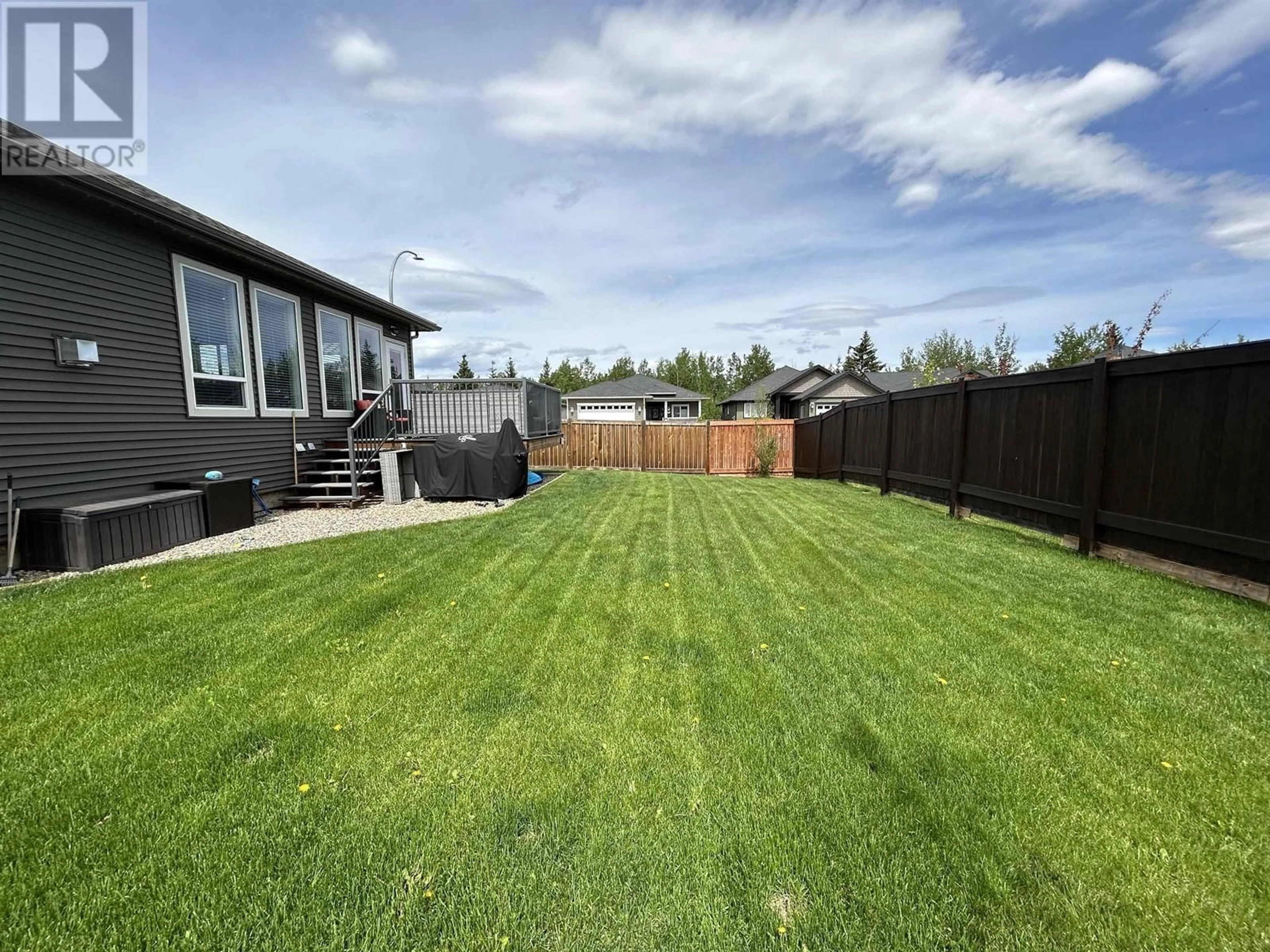 A pic from outside/outdoor area/front of a property/back of a property/a pic from drone, mountain view for 11731 103A STREET, Fort St. John British Columbia V1J0L4