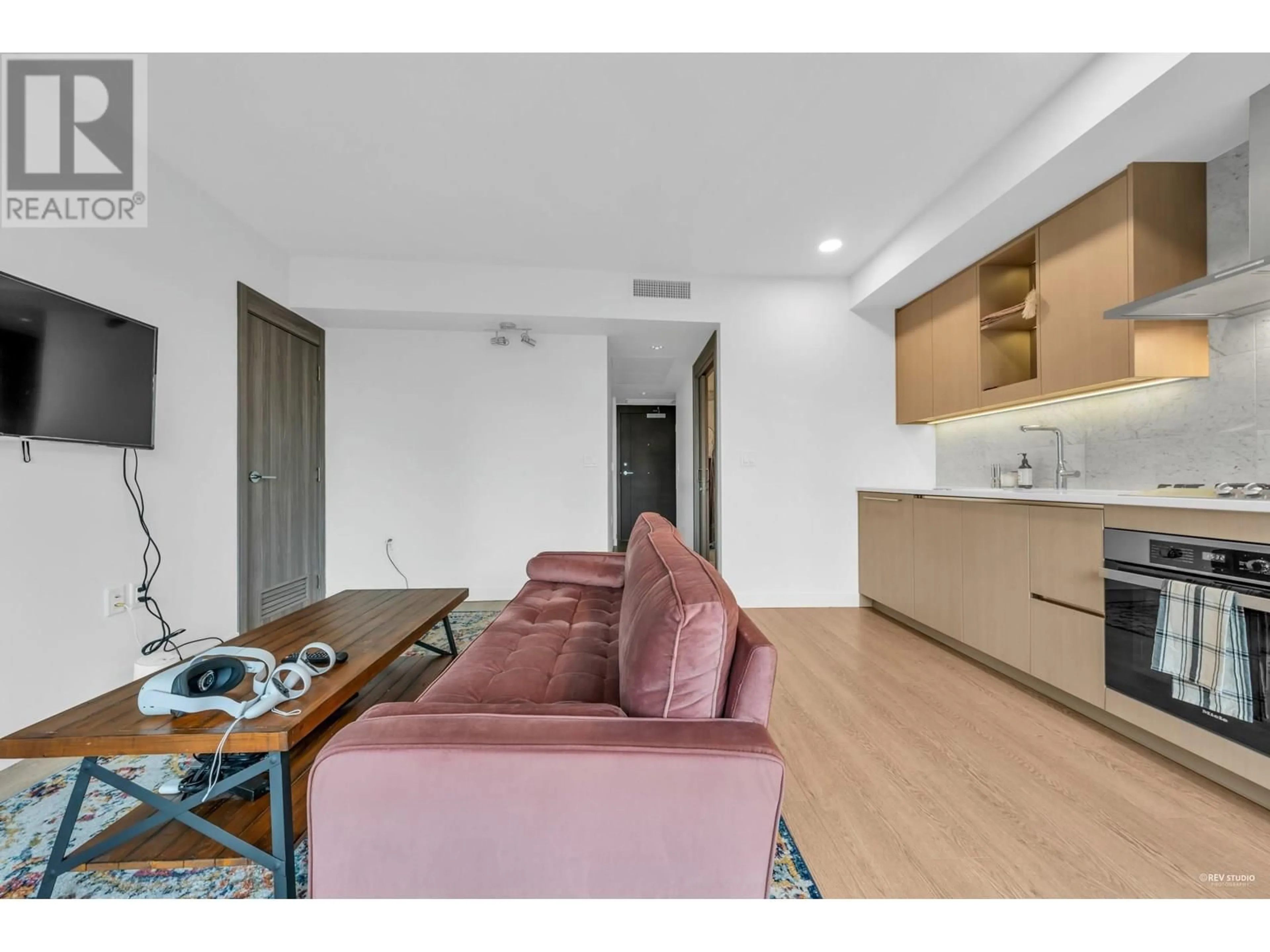 Living room with furniture, unknown for 704 - 89 NELSON STREET, Vancouver British Columbia V6Z0E7