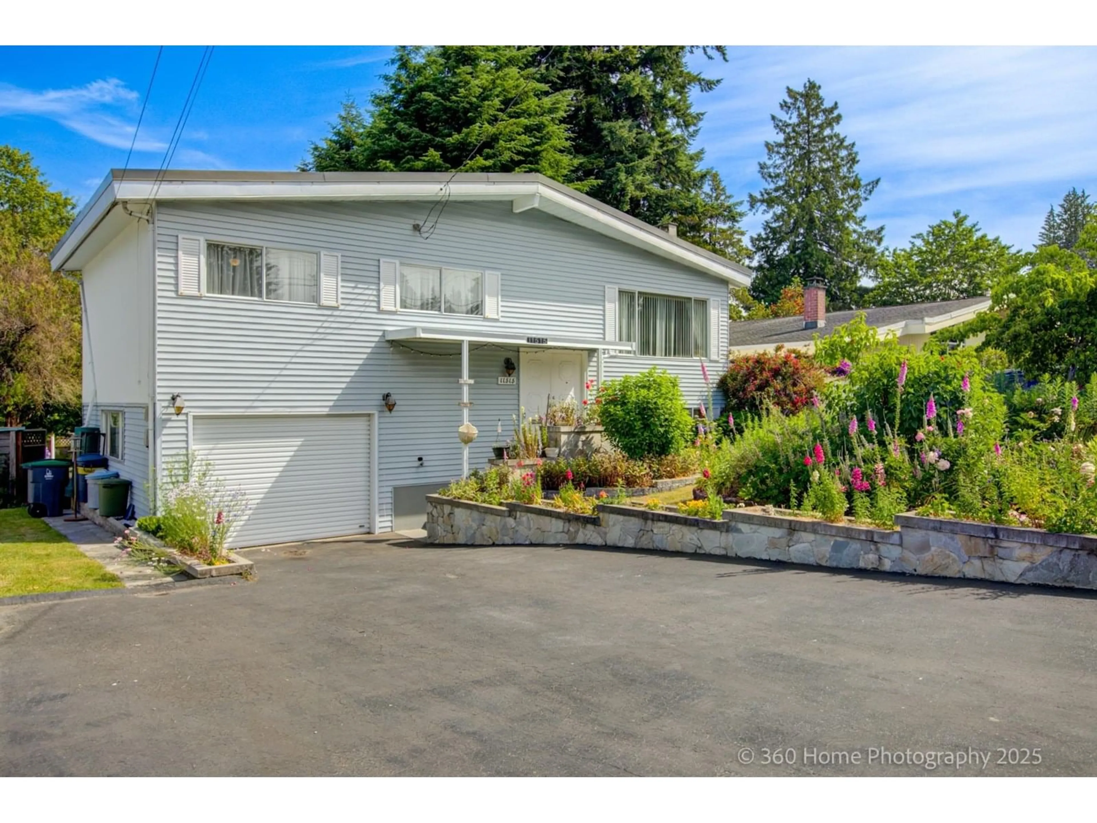 Home with vinyl exterior material, street for 11515 97A, Surrey British Columbia V3V2G3