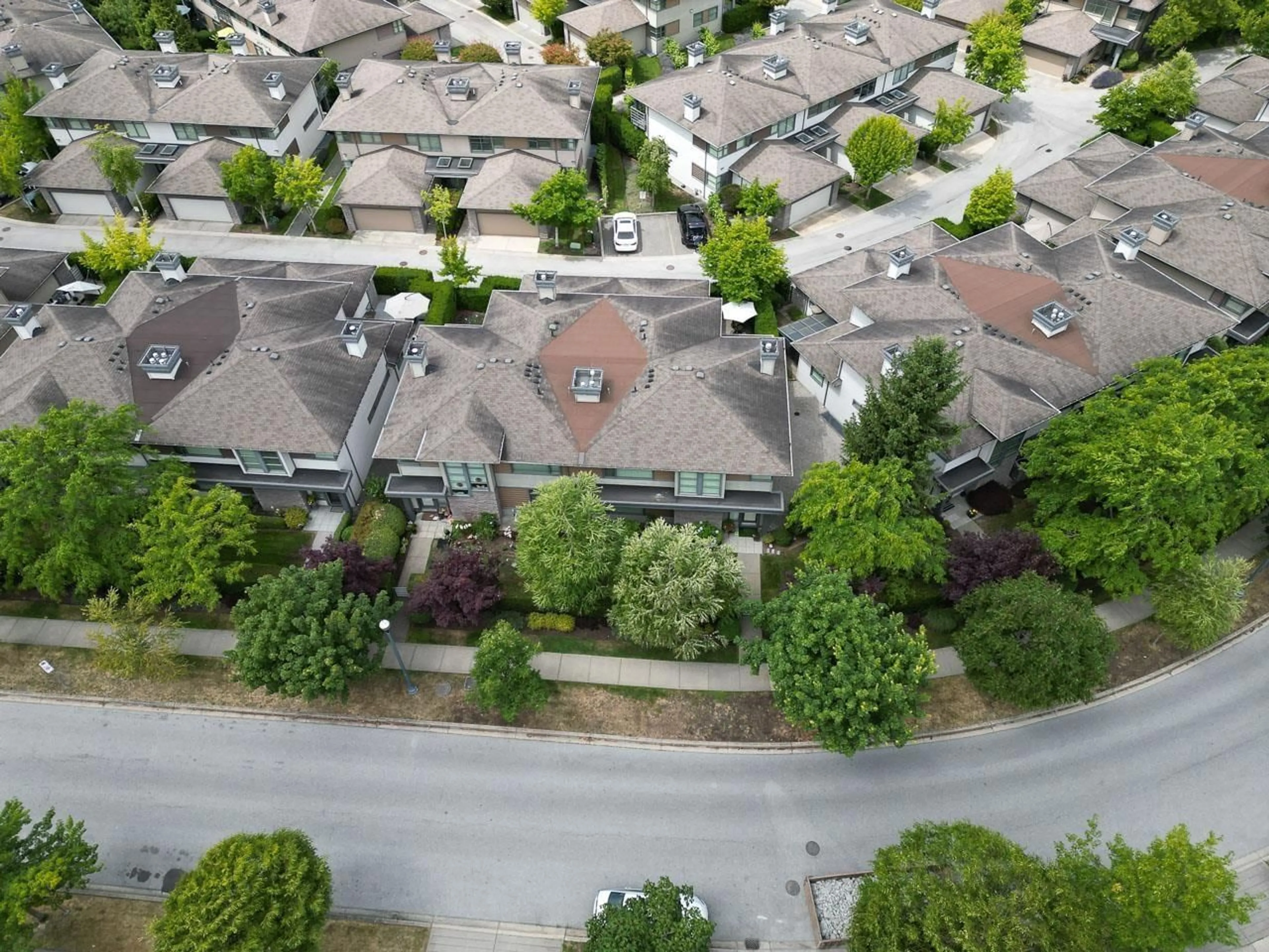 A pic from outside/outdoor area/front of a property/back of a property/a pic from drone, street for 9 - 2603 162, Surrey British Columbia V3Z2L4