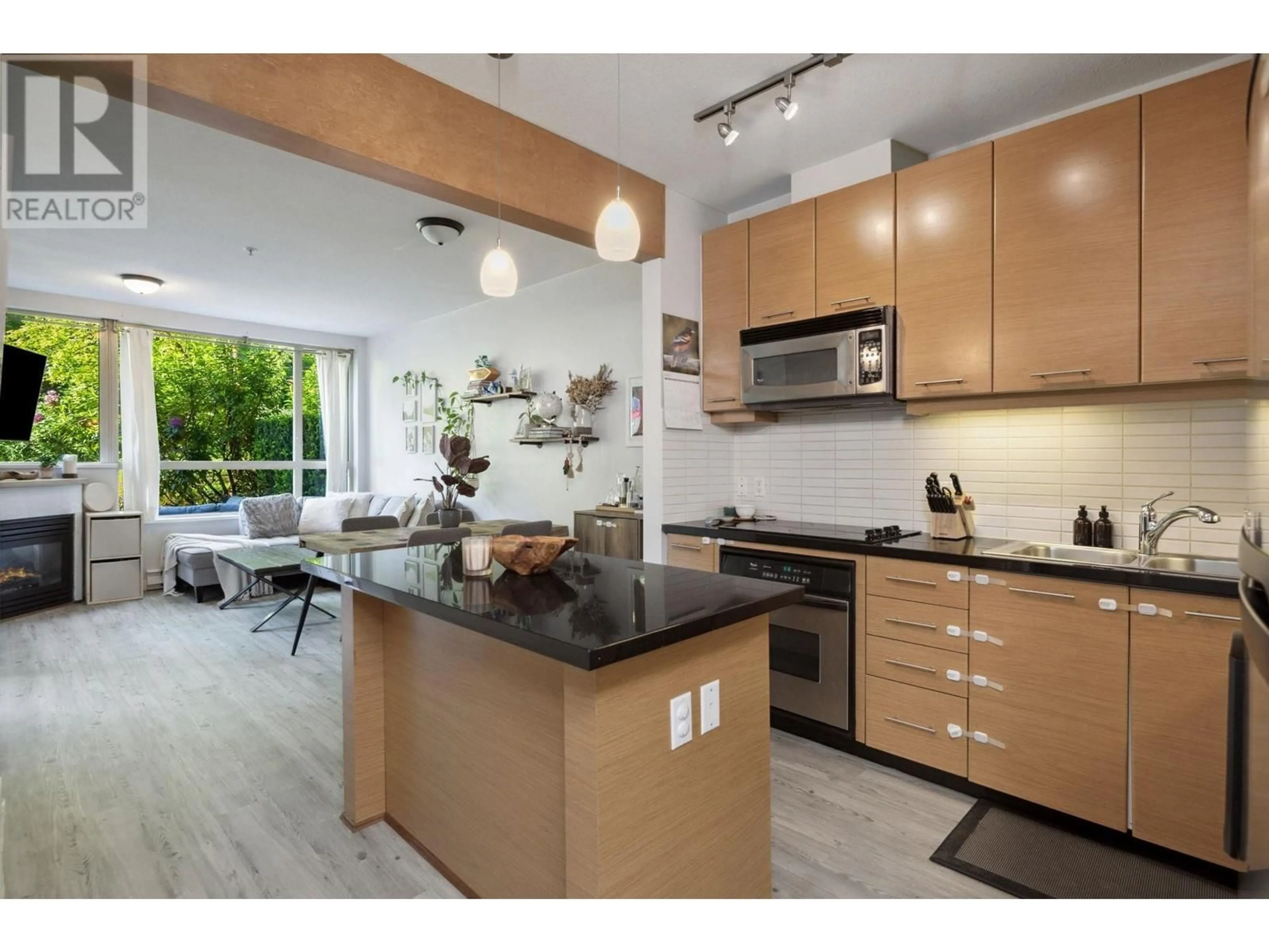 Open concept kitchen, unknown for 210 - 560 RAVEN WOODS DRIVE, North Vancouver British Columbia V7V1H1
