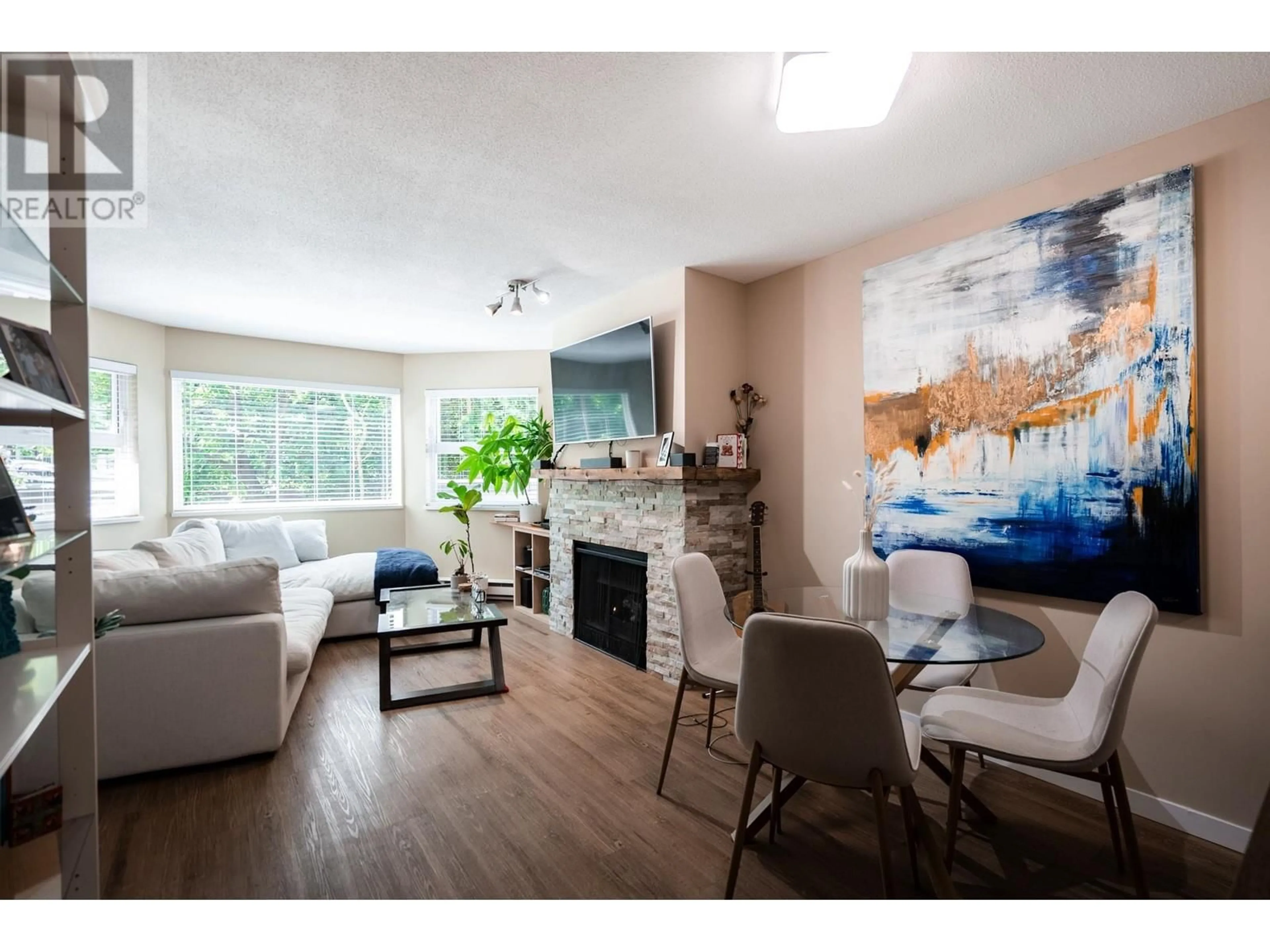 Living room with furniture, wood/laminate floor for 212 - 4885 53 STREET, Delta British Columbia V4K2Z3