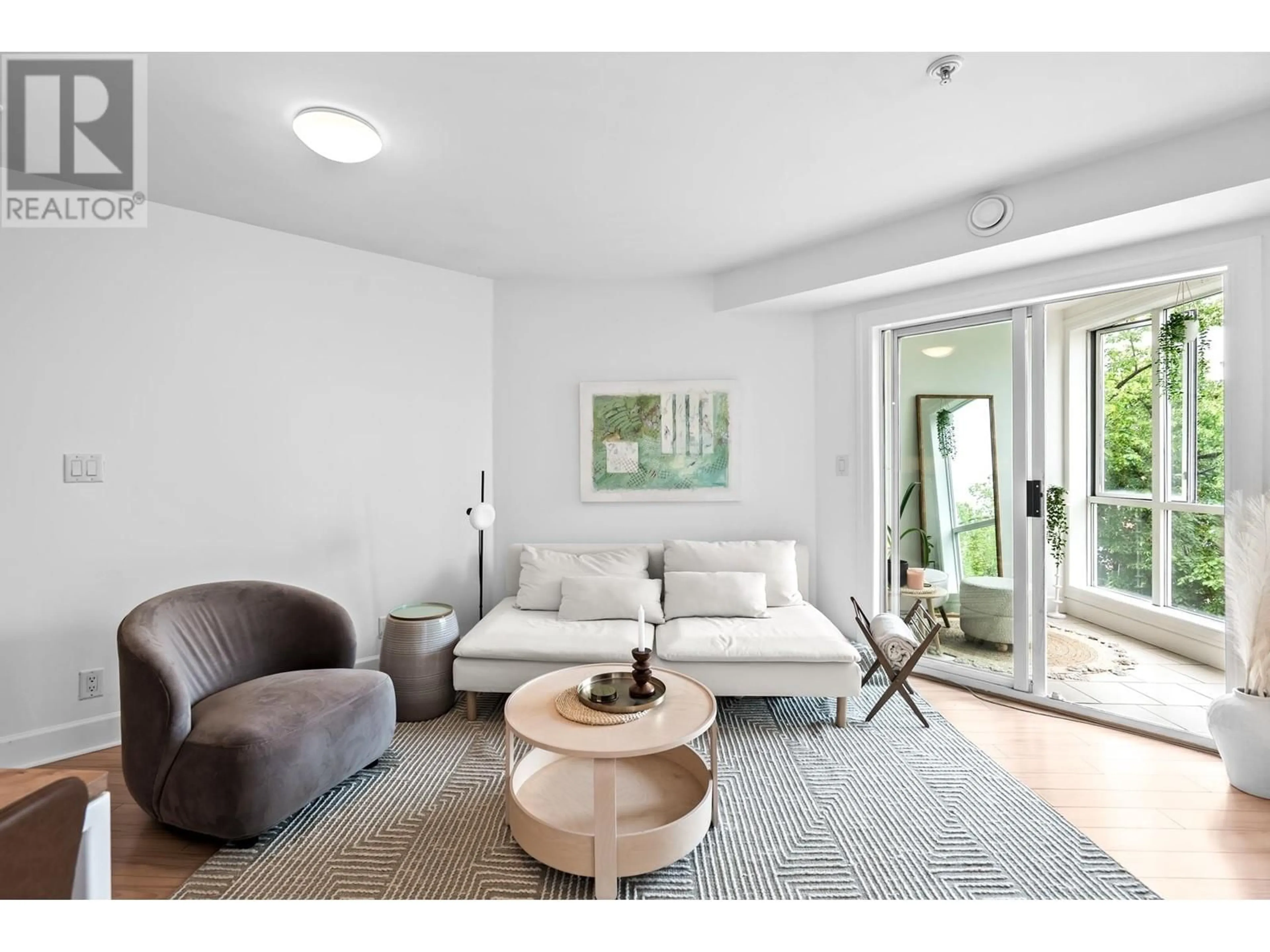 Living room with furniture, unknown for 303 - 1718 VENABLES STREET, Vancouver British Columbia V5L2H4