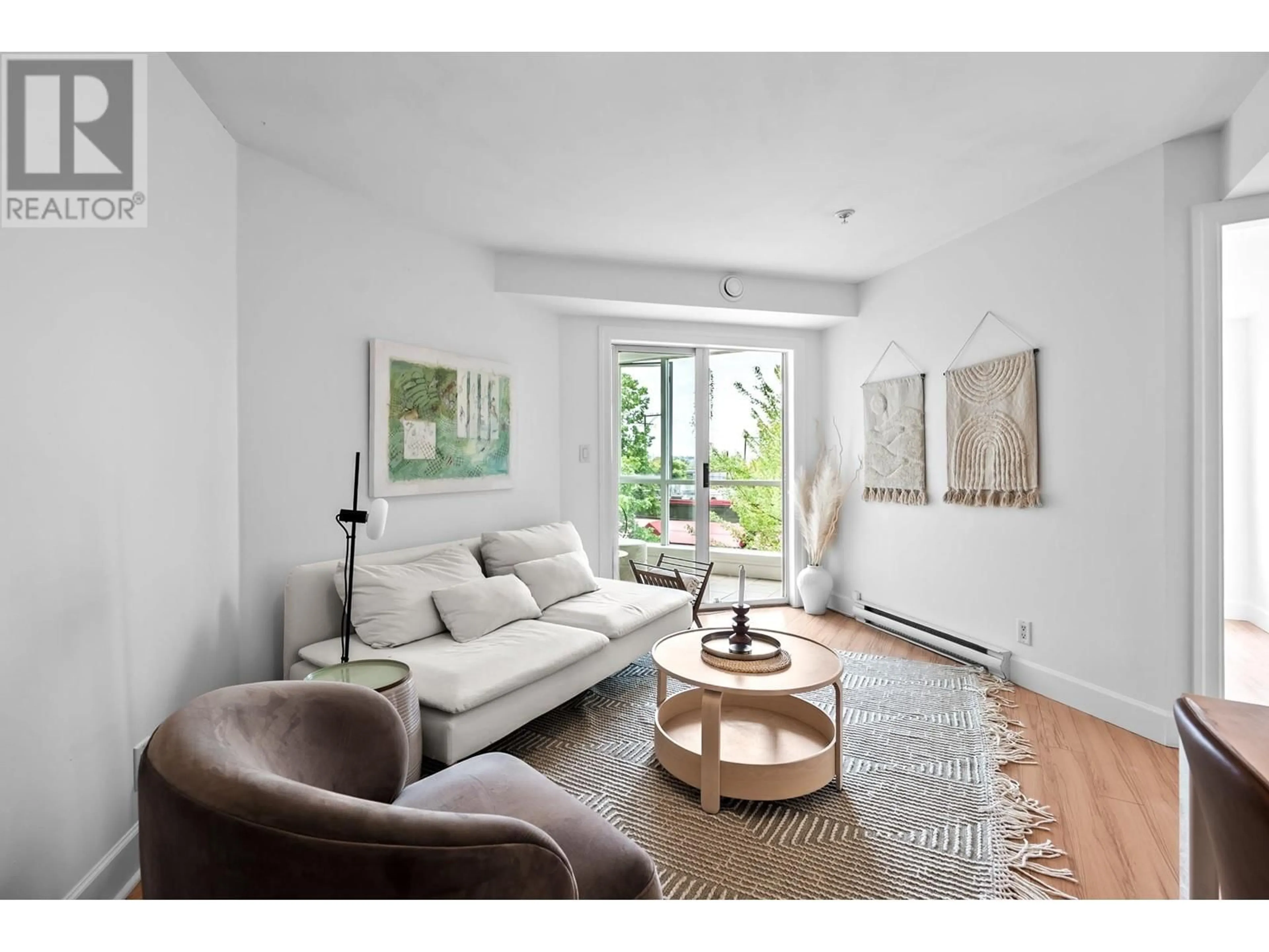 Living room with furniture, unknown for 303 - 1718 VENABLES STREET, Vancouver British Columbia V5L2H4