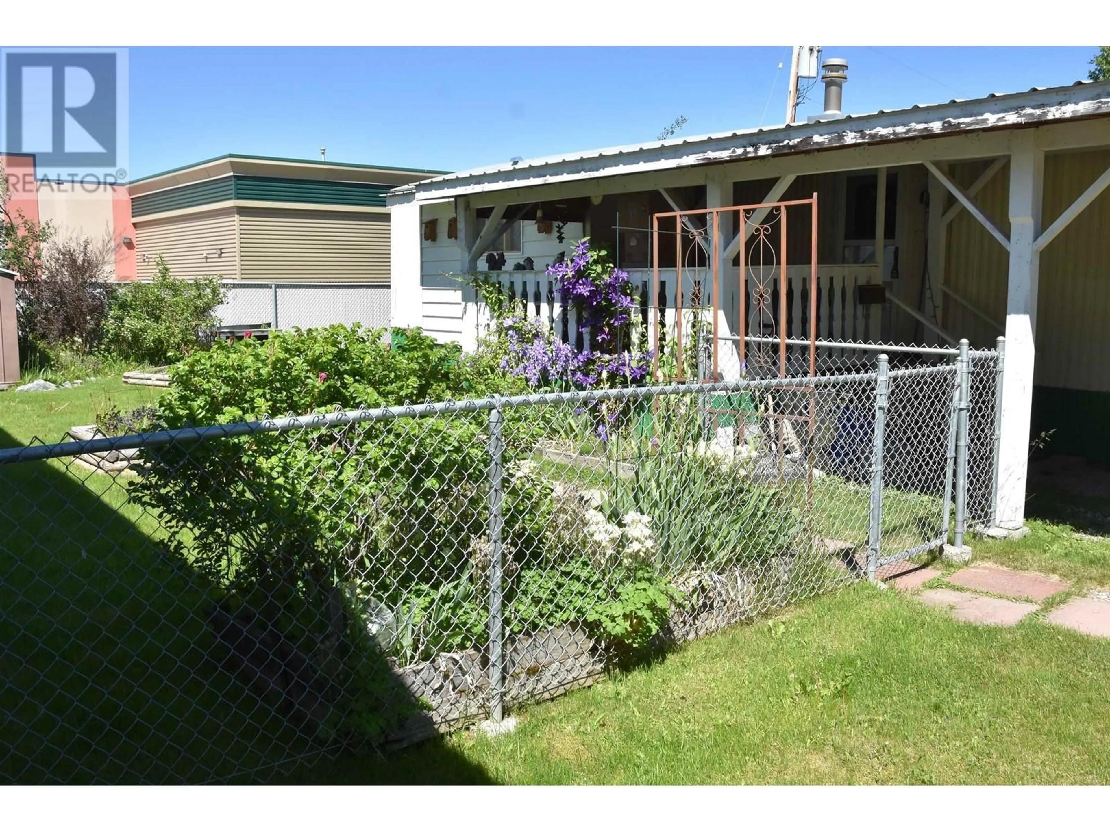 A pic from outside/outdoor area/front of a property/back of a property/a pic from drone, unknown for 12 - 2377 LARCH AVENUE, Quesnel British Columbia V2J4R9