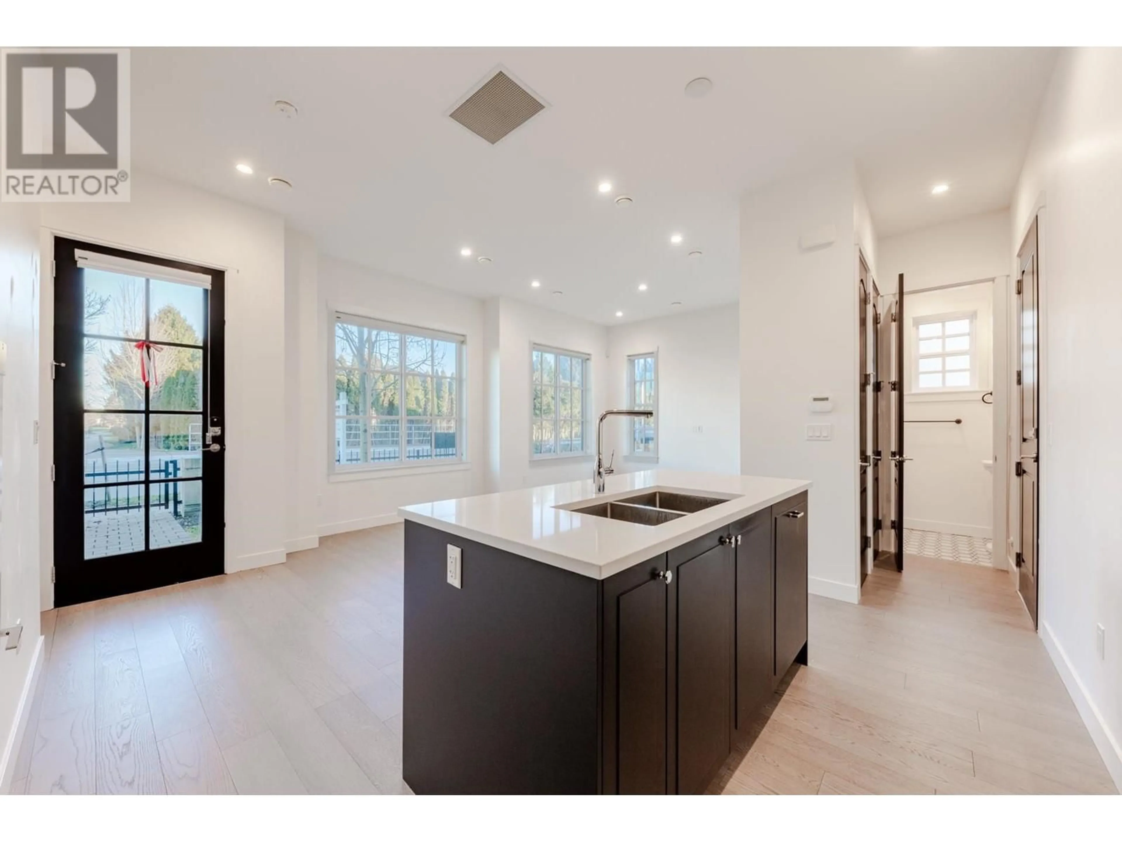 Open concept kitchen, ceramic/tile floor for 1 - 10495 NO. 2 ROAD, Richmond British Columbia V7E2E5