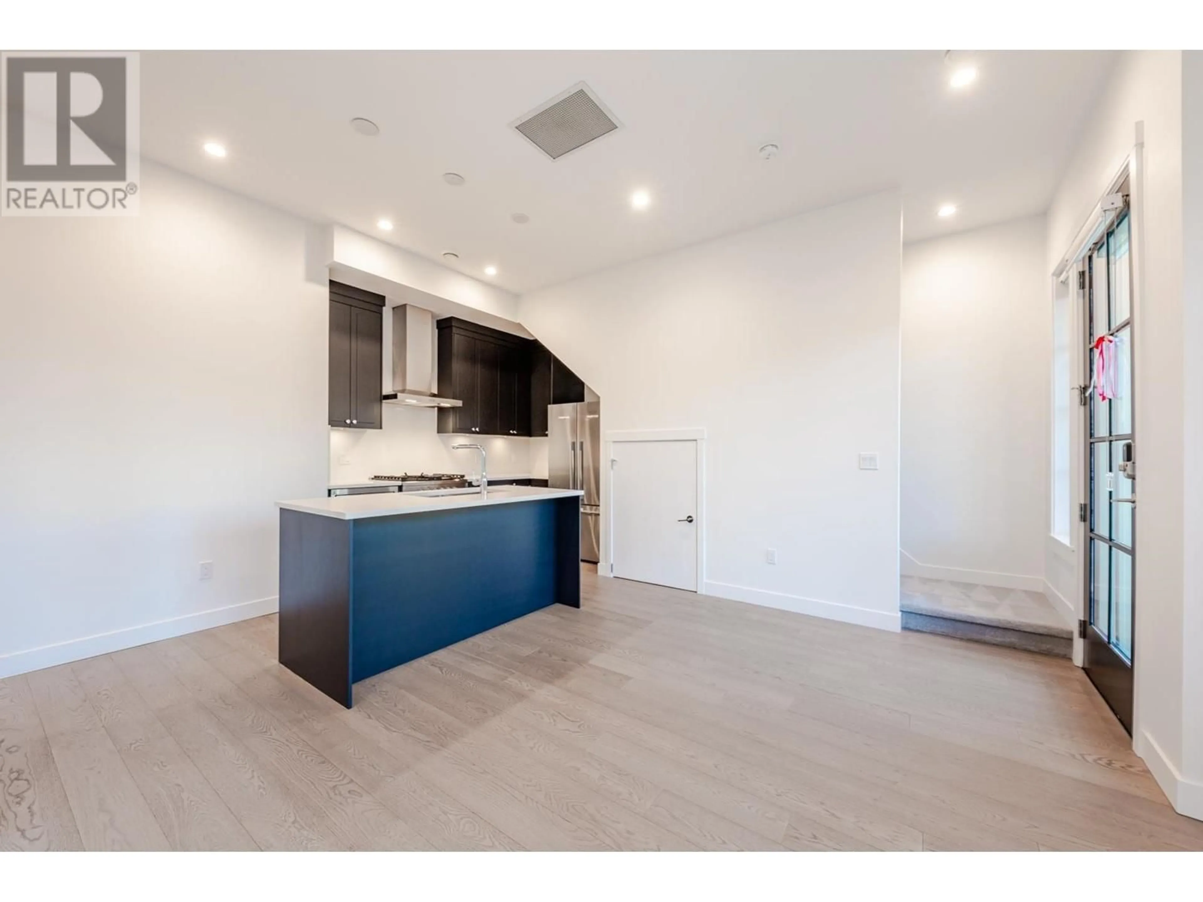 Open concept kitchen, unknown for 1 - 10495 NO. 2 ROAD, Richmond British Columbia V7E2E5