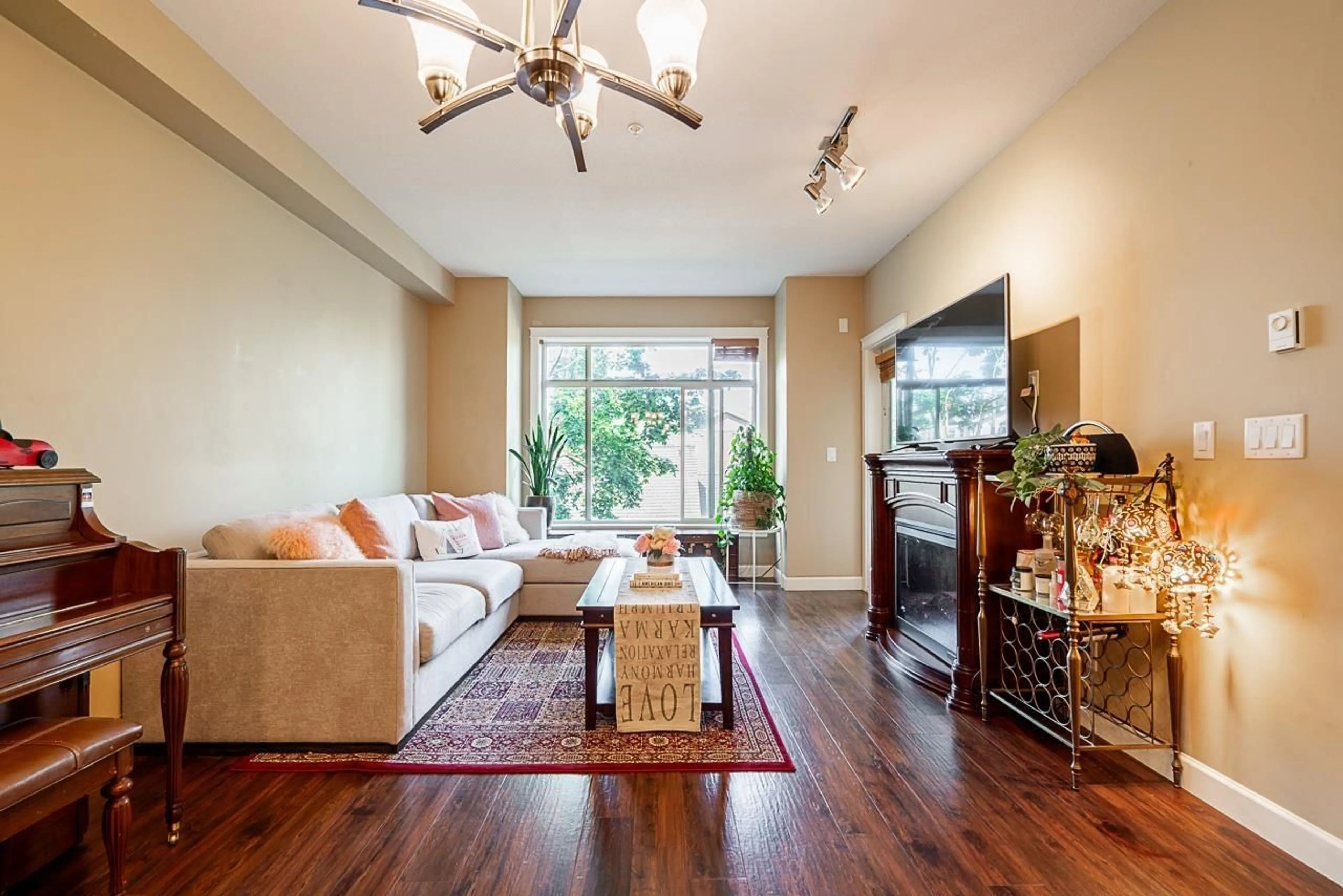 Living room with furniture, wood/laminate floor for 266 - 8328 207A, Langley British Columbia V2Y0K5