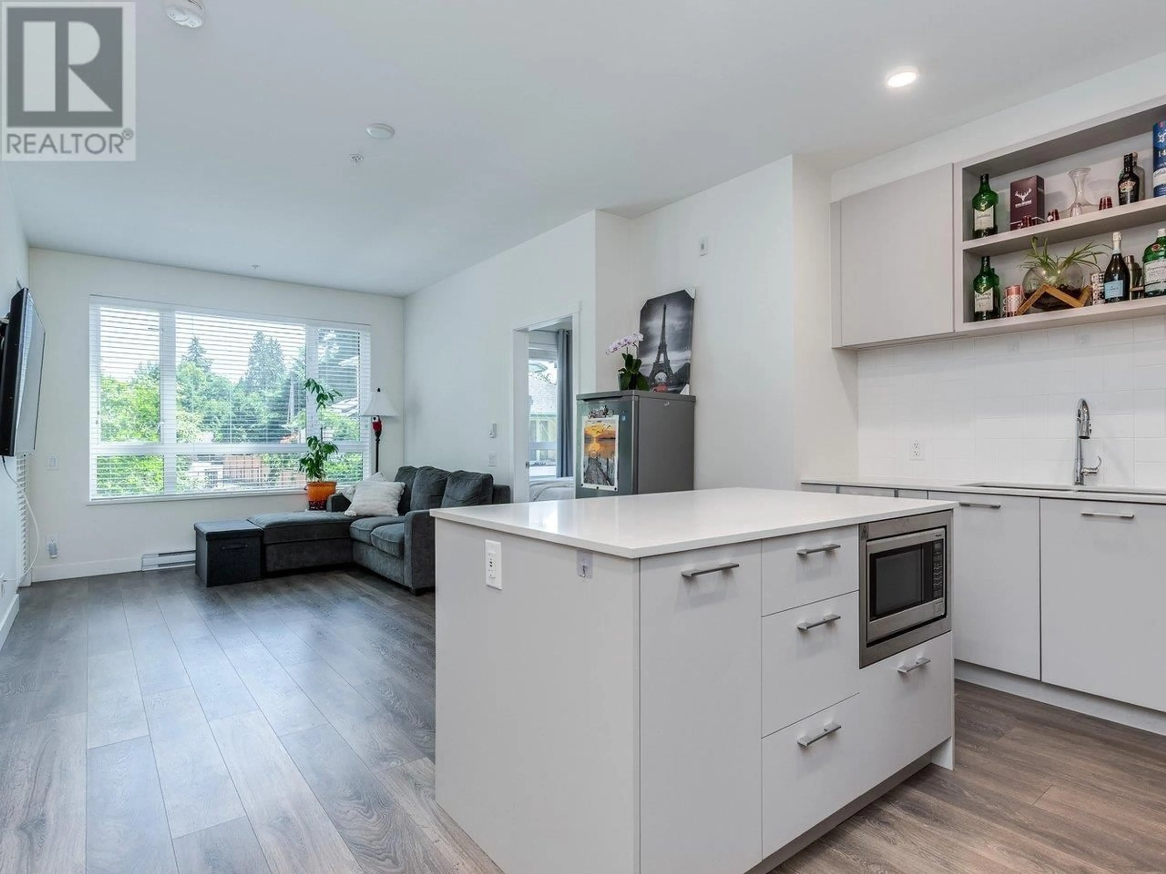 Open concept kitchen, wood/laminate floor for 207 - 721 ANSKAR COURT, Coquitlam British Columbia V3J0L4