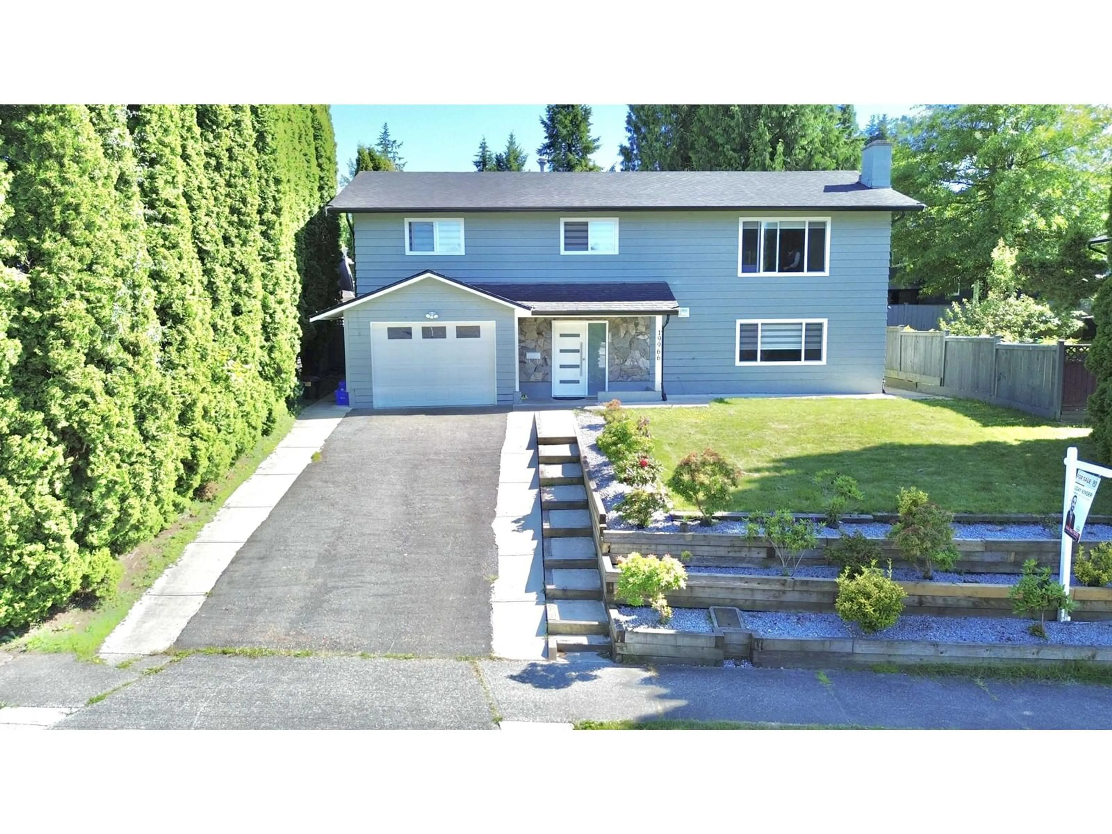 A pic from outside/outdoor area/front of a property/back of a property/a pic from drone, street for 19966 50A, Langley British Columbia V3A6S1