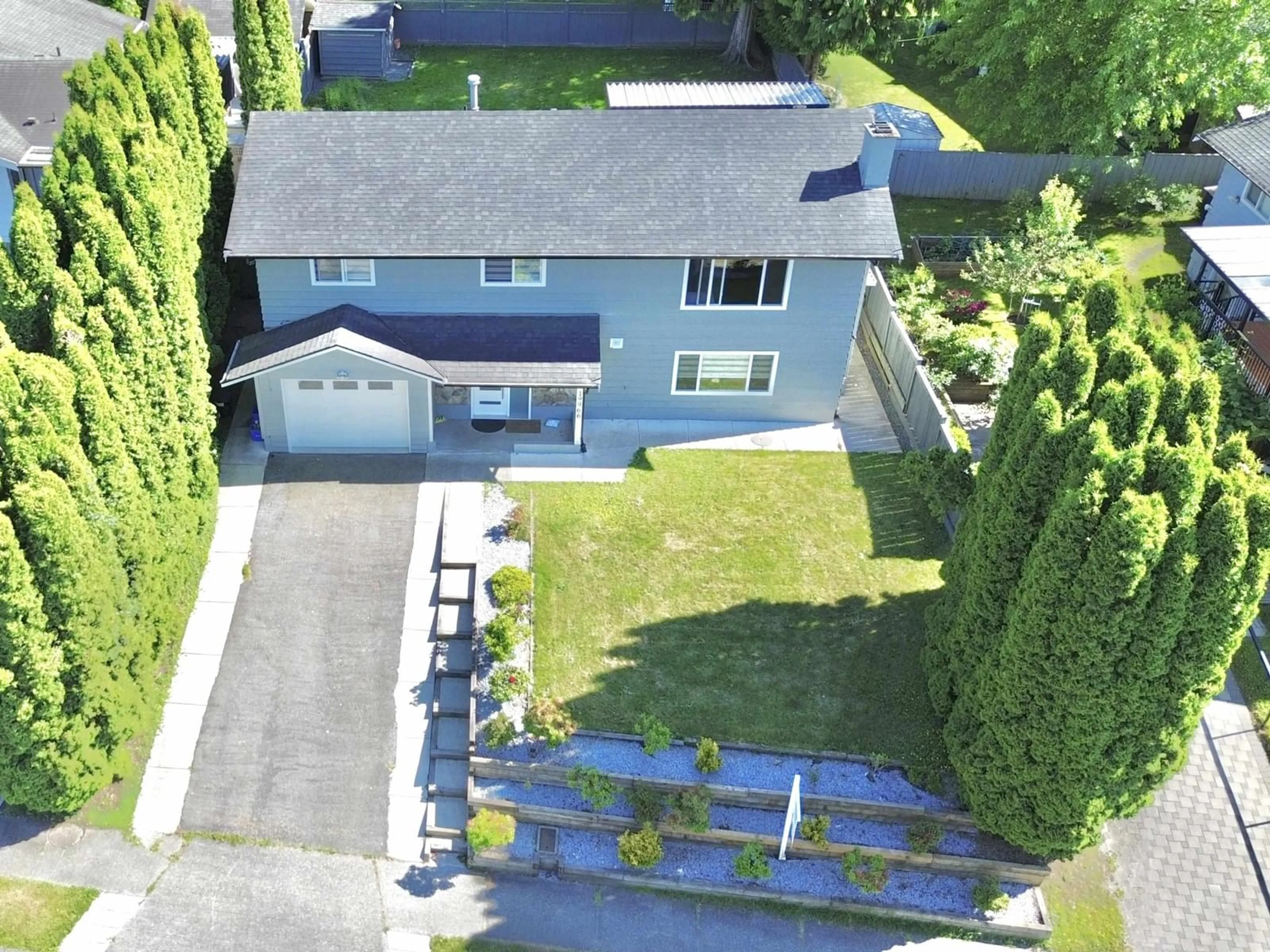 A pic from outside/outdoor area/front of a property/back of a property/a pic from drone, street for 19966 50A, Langley British Columbia V3A6S1