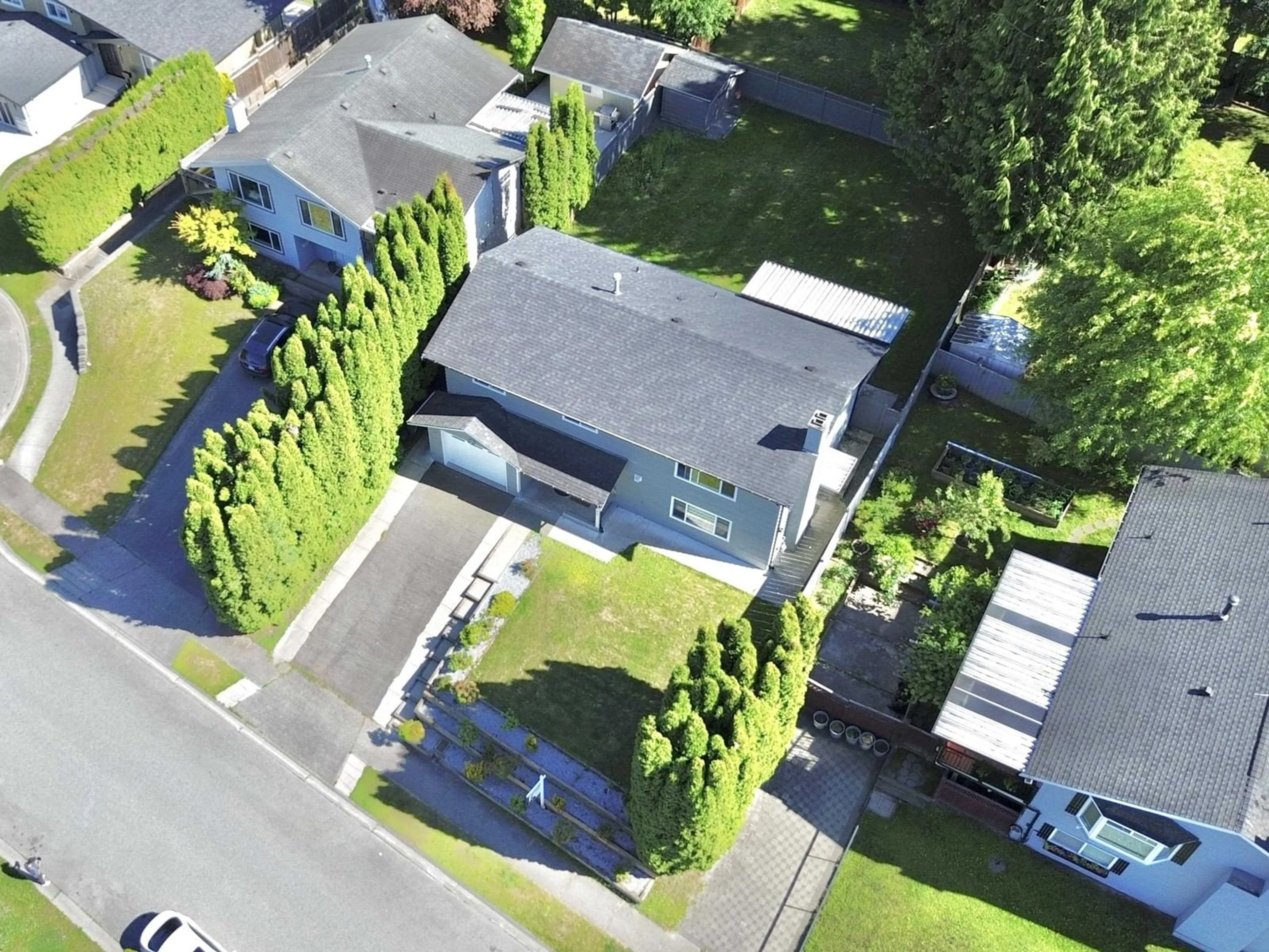 A pic from outside/outdoor area/front of a property/back of a property/a pic from drone, street for 19966 50A, Langley British Columbia V3A6S1
