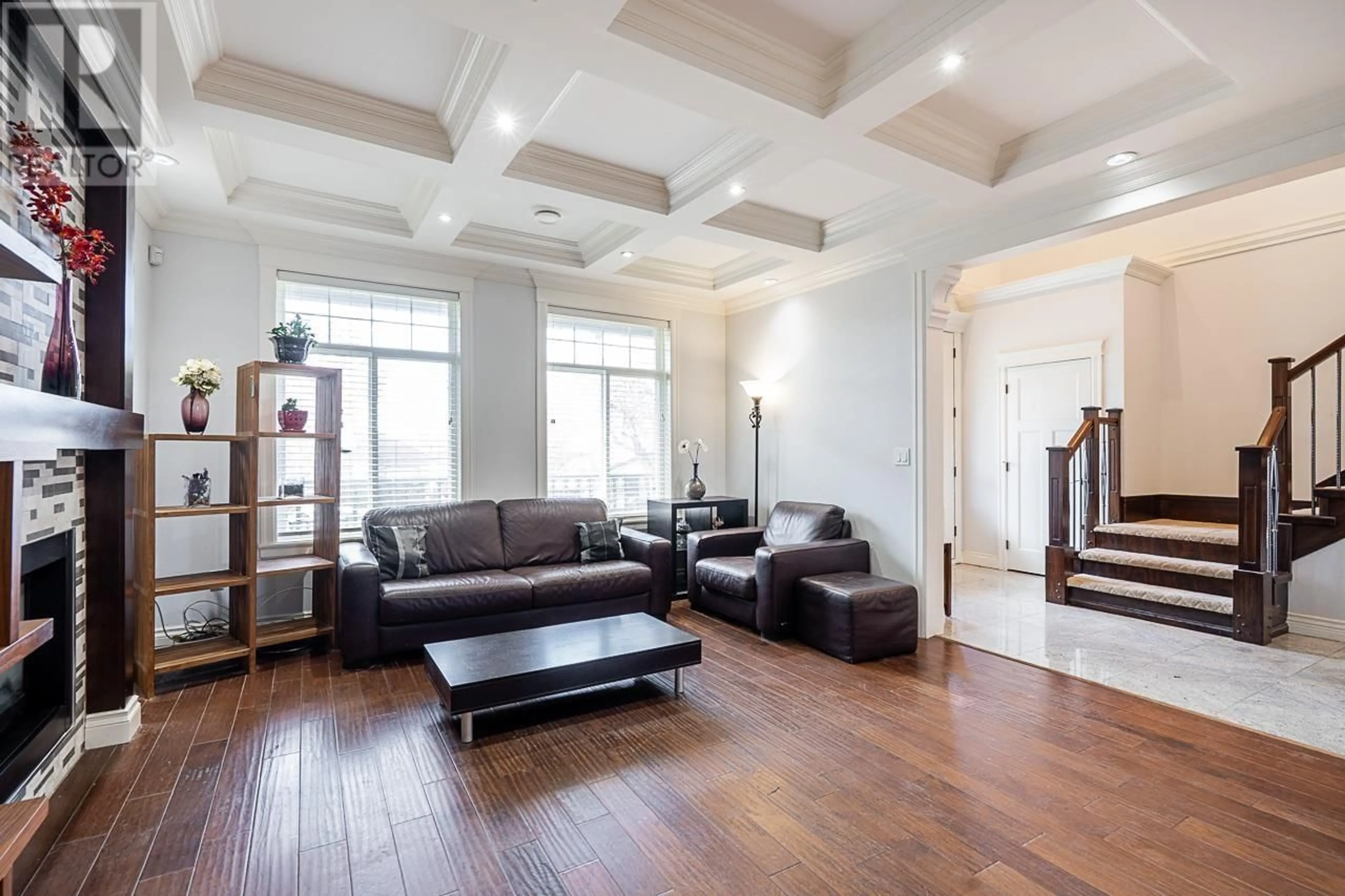 Living room with furniture, wood/laminate floor for 3795 UNION STREET, Burnaby British Columbia V5C2W2