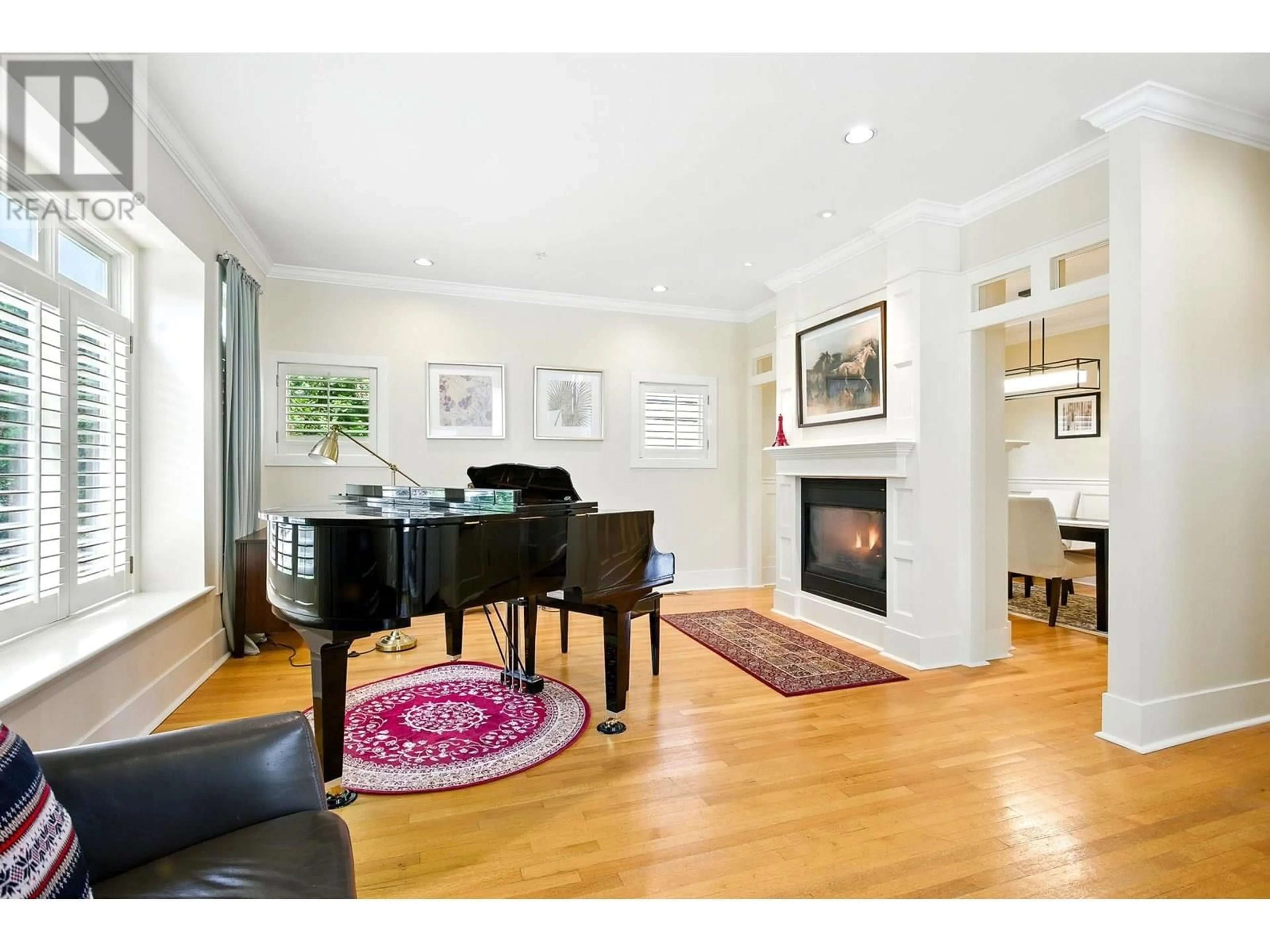 Living room with furniture, wood/laminate floor for 4420 COLLINGWOOD STREET, Vancouver British Columbia V6S2B1