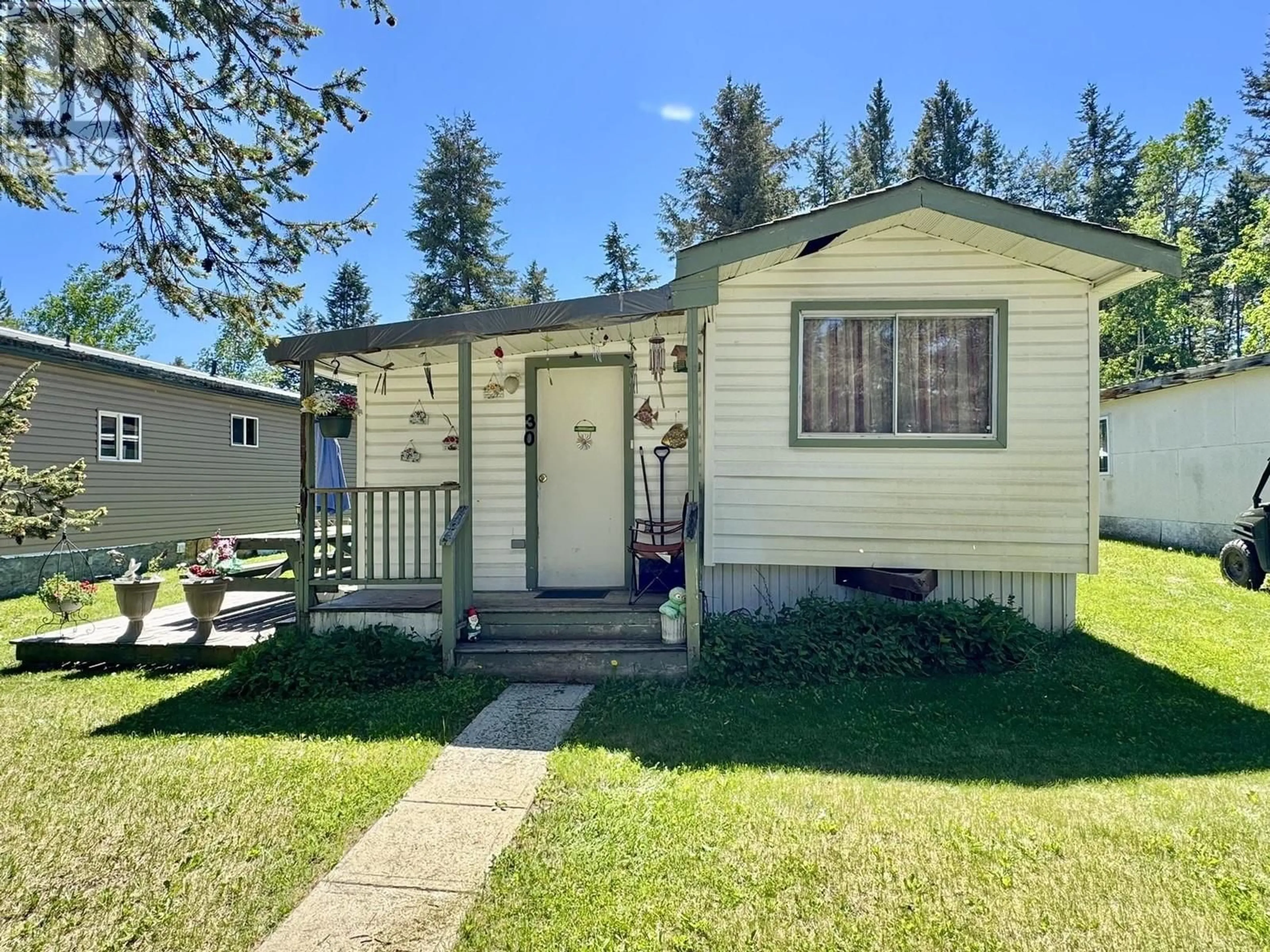 Home with vinyl exterior material, street for 30 - 5378 PARK DRIVE, 103 Mile House British Columbia V0K2E1