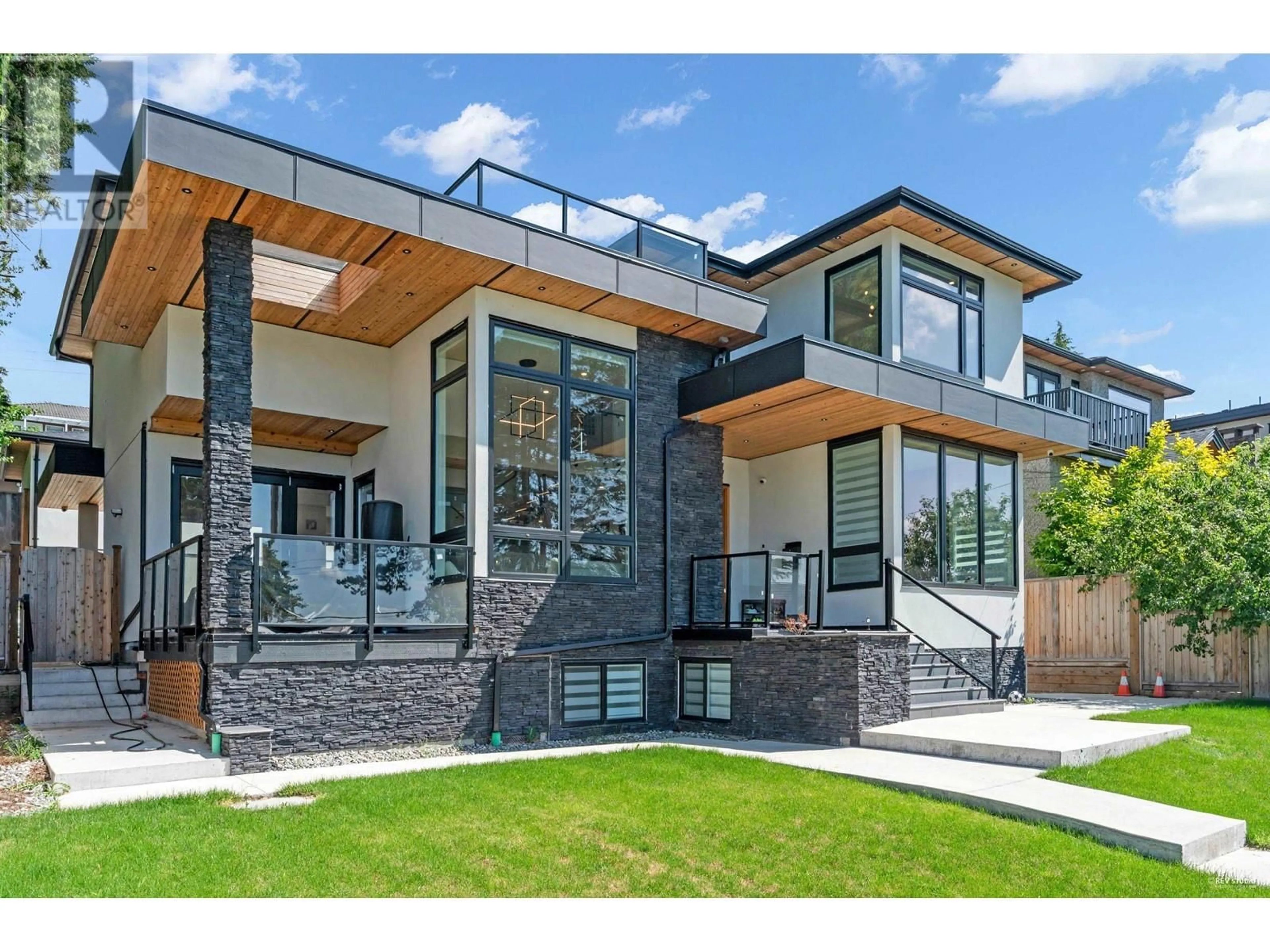 Home with brick exterior material, mountain view for 5243 CARSON STREET, Burnaby British Columbia V5J2Z3