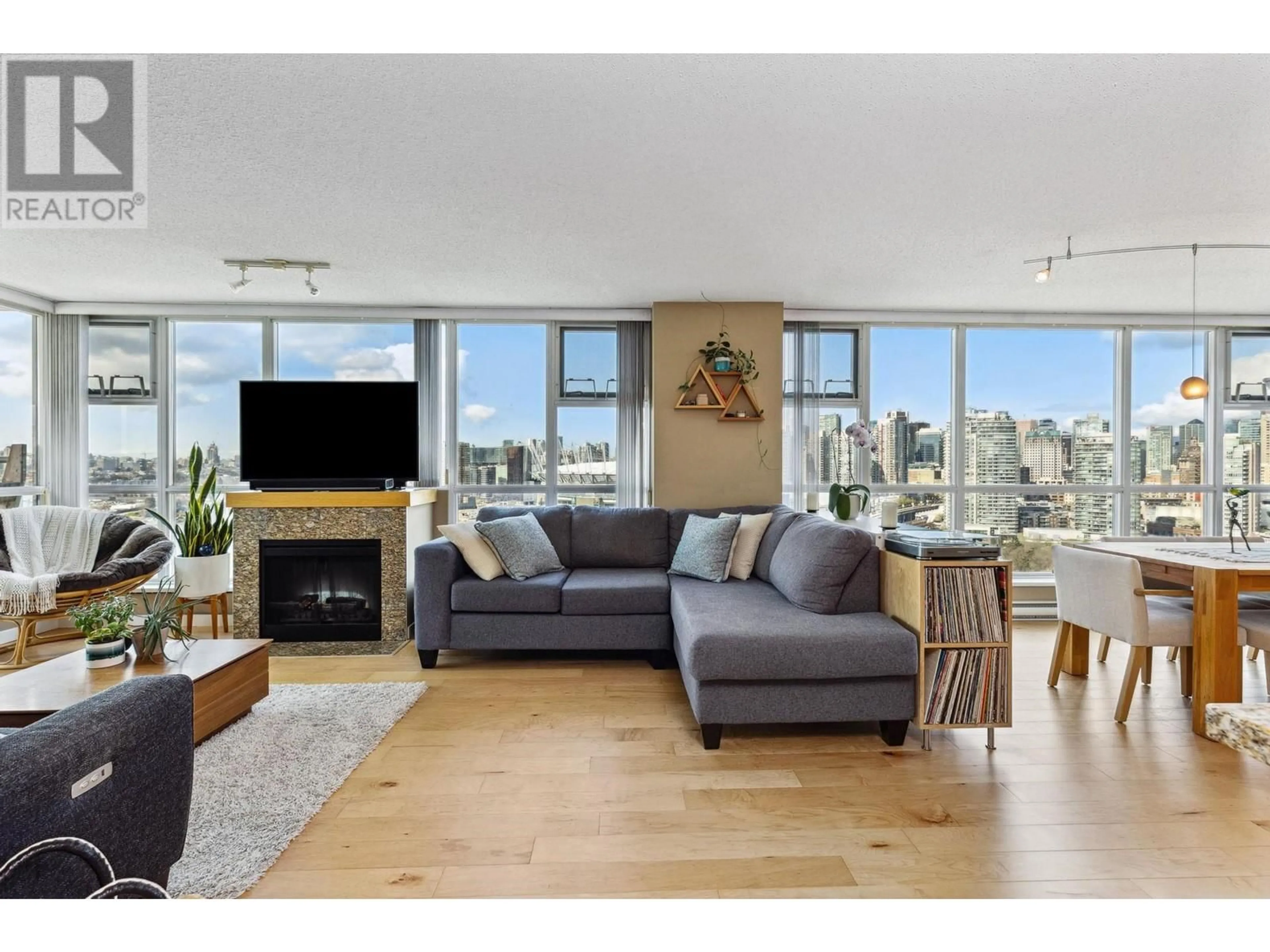Living room with furniture, wood/laminate floor for 2102 - 125 MILROSS AVENUE, Vancouver British Columbia V6A0A1