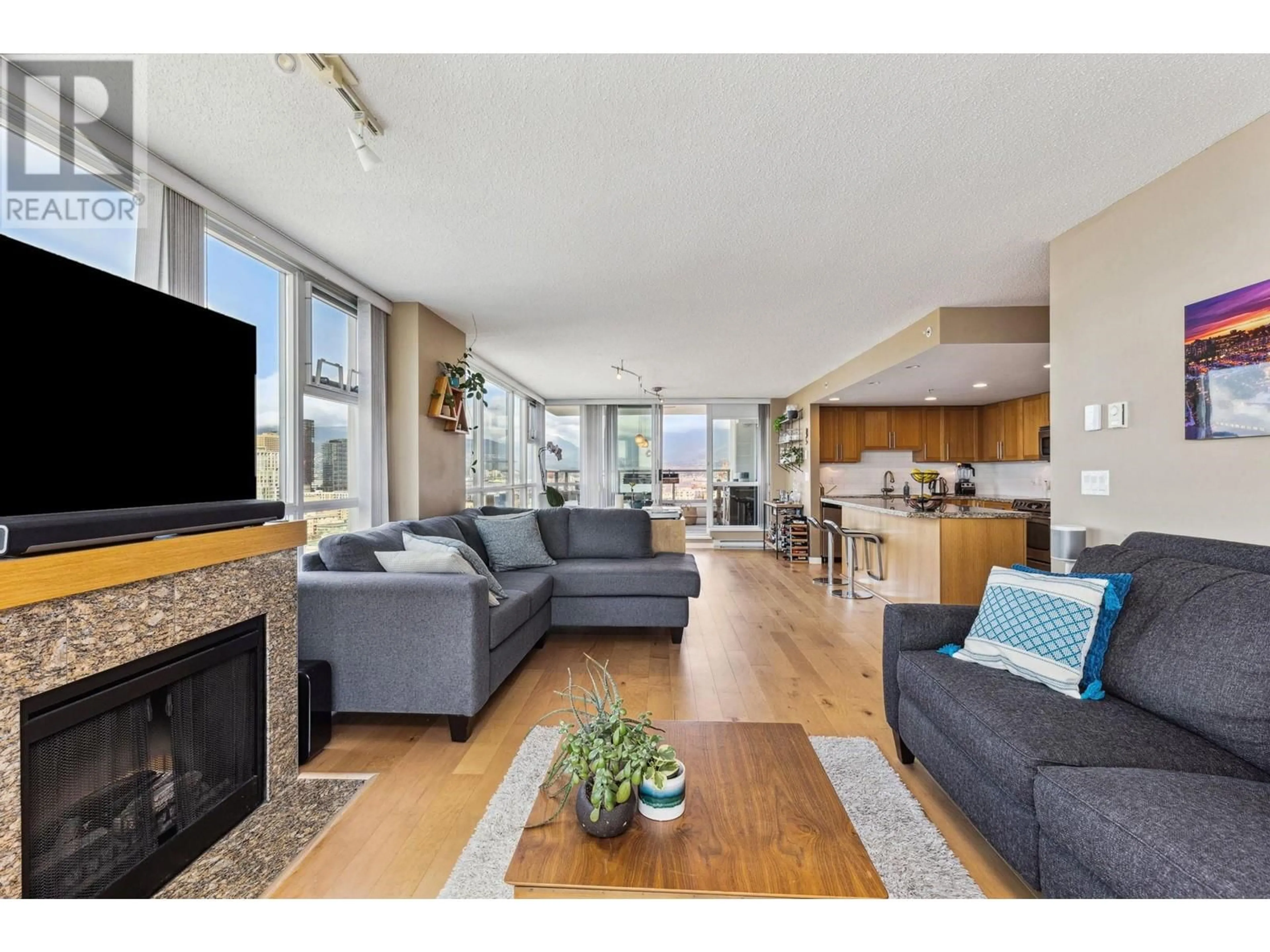 Living room with furniture, wood/laminate floor for 2102 - 125 MILROSS AVENUE, Vancouver British Columbia V6A0A1