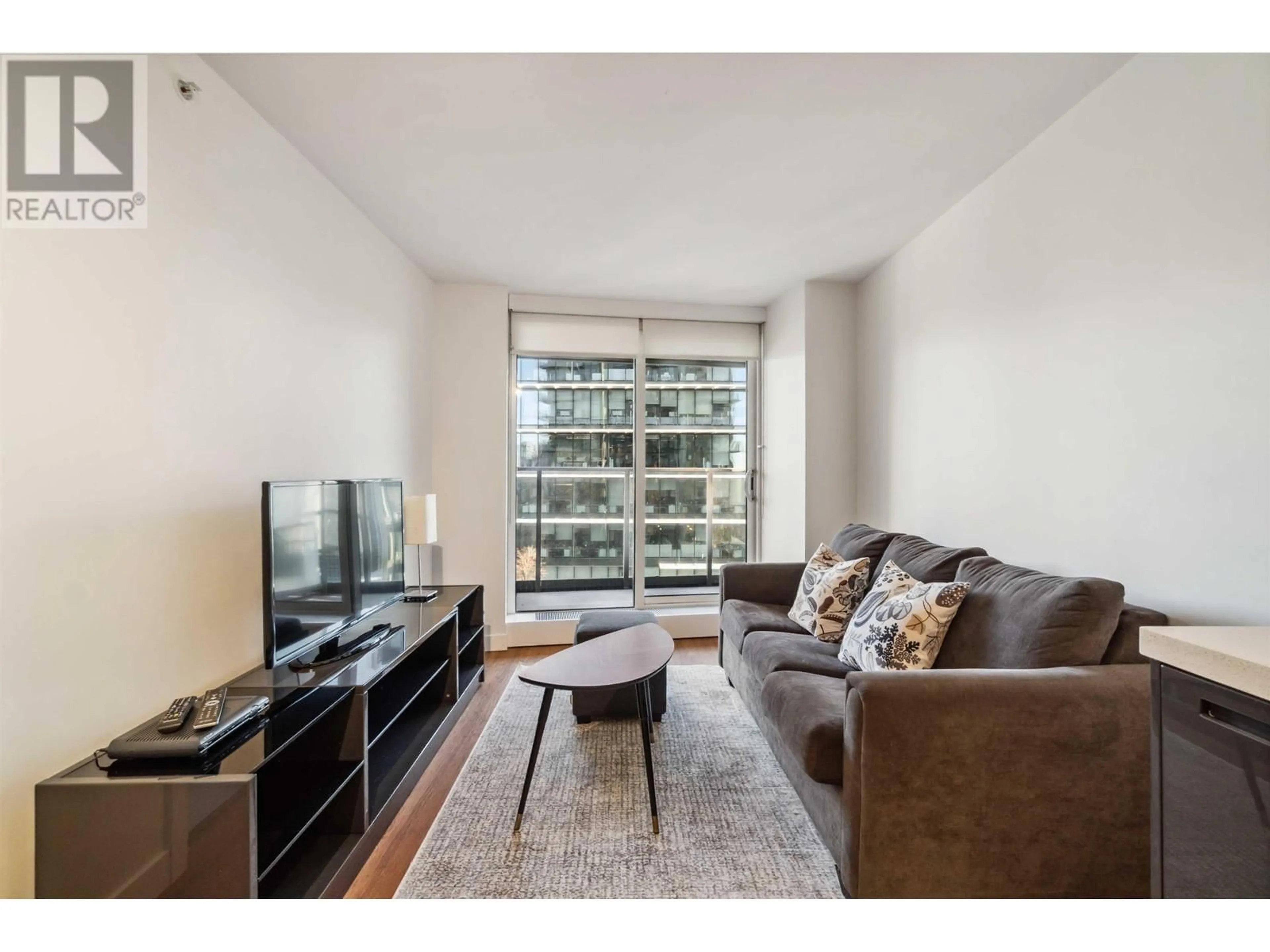 Living room with furniture, wood/laminate floor for 2807 - 777 RICHARDS STREET, Vancouver British Columbia V6B0M6
