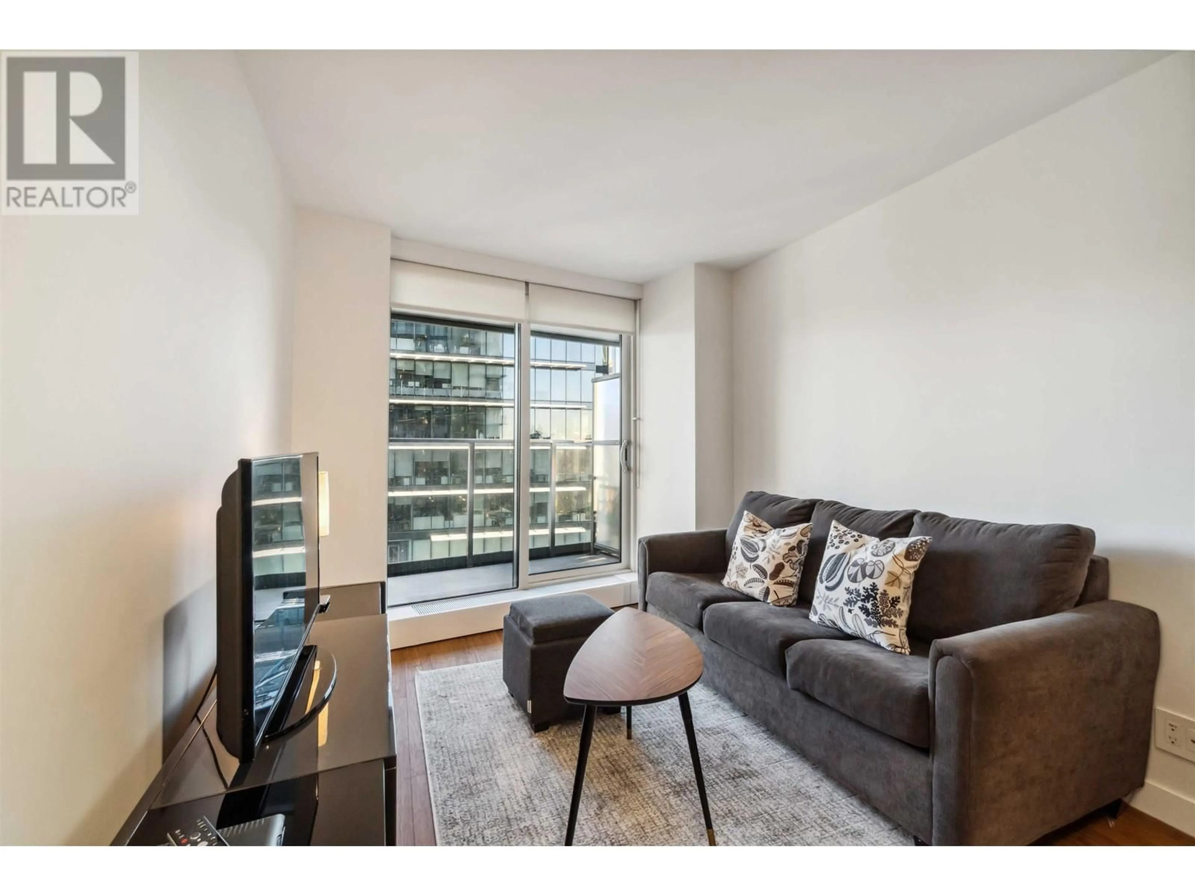 Living room with furniture, wood/laminate floor for 2807 - 777 RICHARDS STREET, Vancouver British Columbia V6B0M6