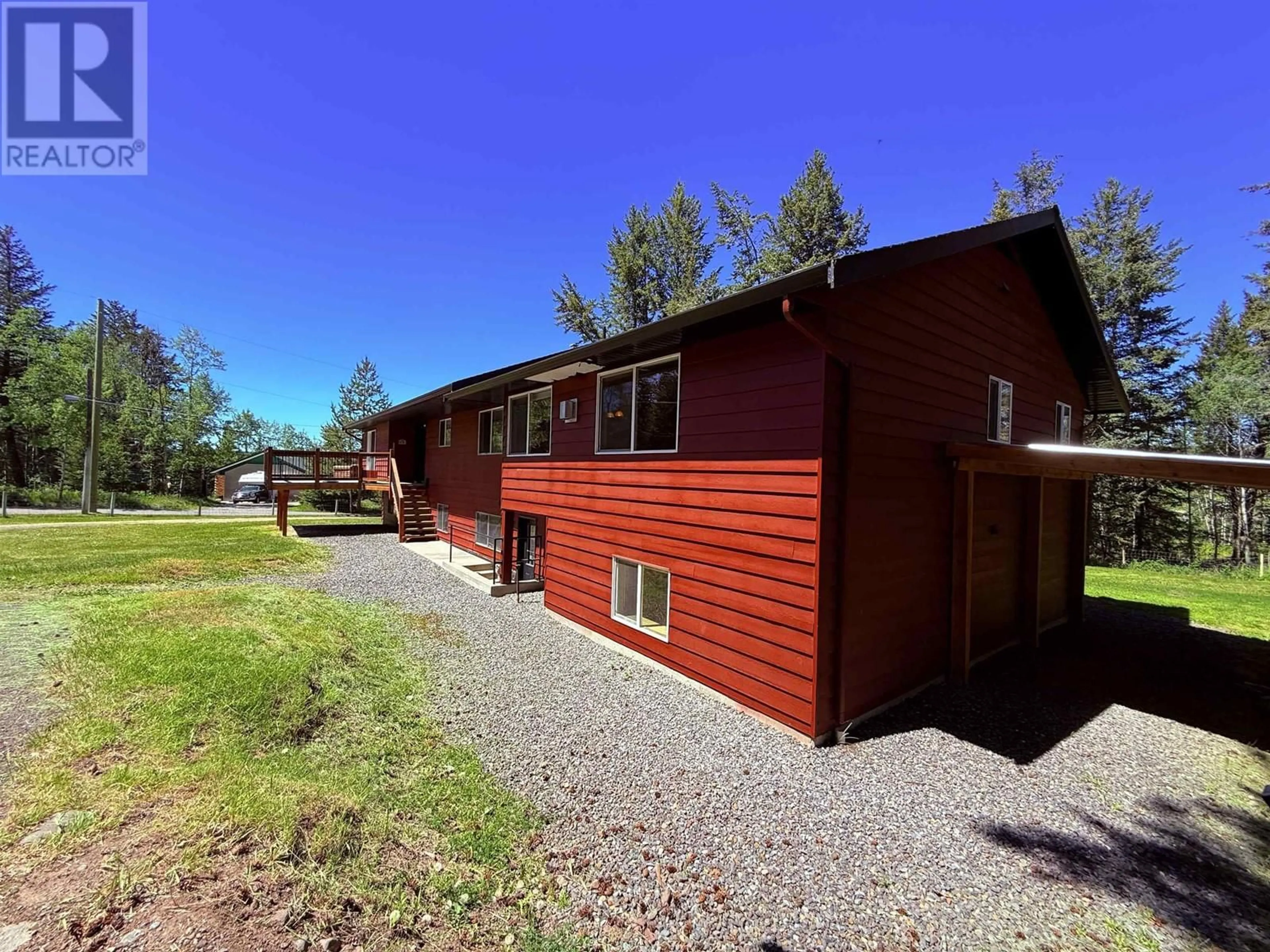 A pic from outside/outdoor area/front of a property/back of a property/a pic from drone, unknown for 4719 CARIBOO DRIVE, 108 Mile Ranch British Columbia V0K2Z0