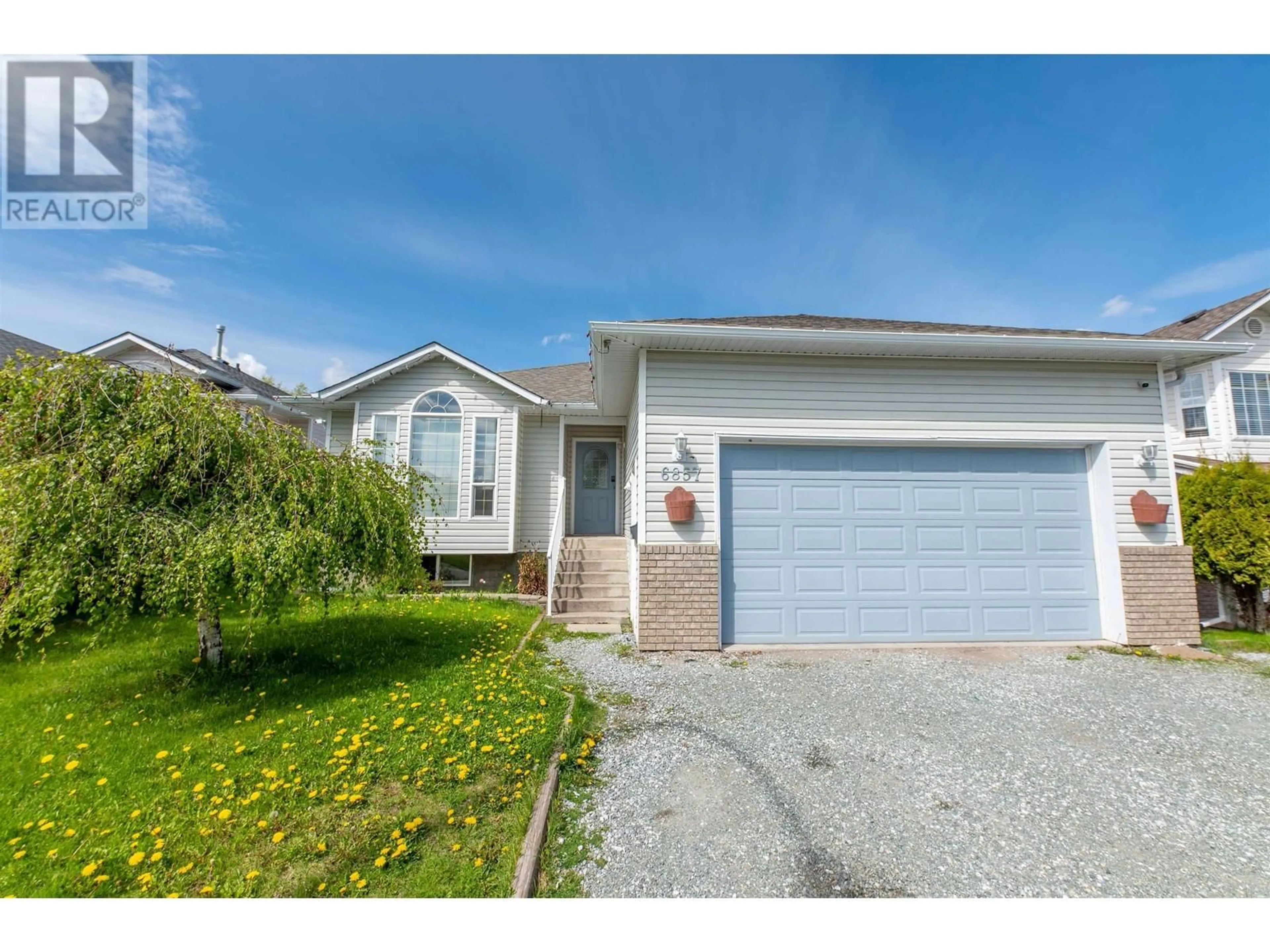 Home with vinyl exterior material, street for 6857 WESTGATE AVENUE, Prince George British Columbia V2N5R2