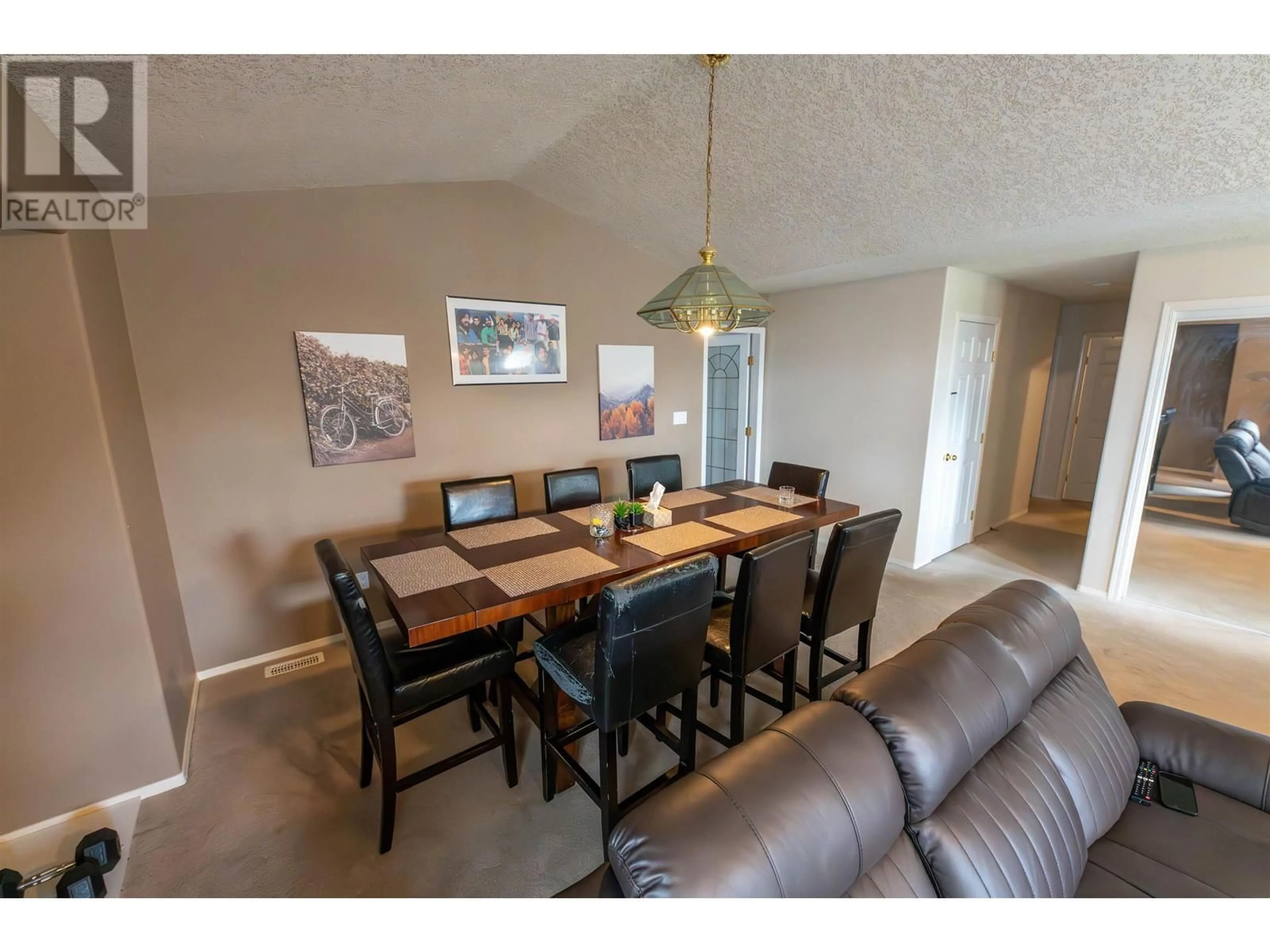 Dining room, wood/laminate floor for 6857 WESTGATE AVENUE, Prince George British Columbia V2N5R2
