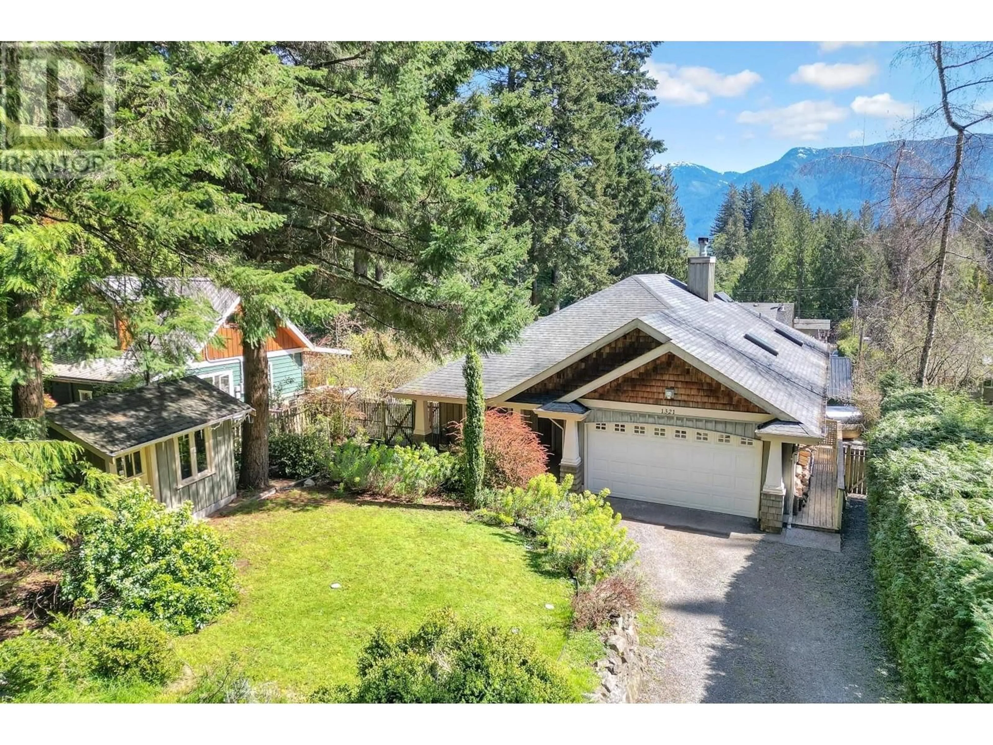 A pic from outside/outdoor area/front of a property/back of a property/a pic from drone, mountain view for 1321 HILLCREST ROAD, Bowen Island British Columbia V0N1G1