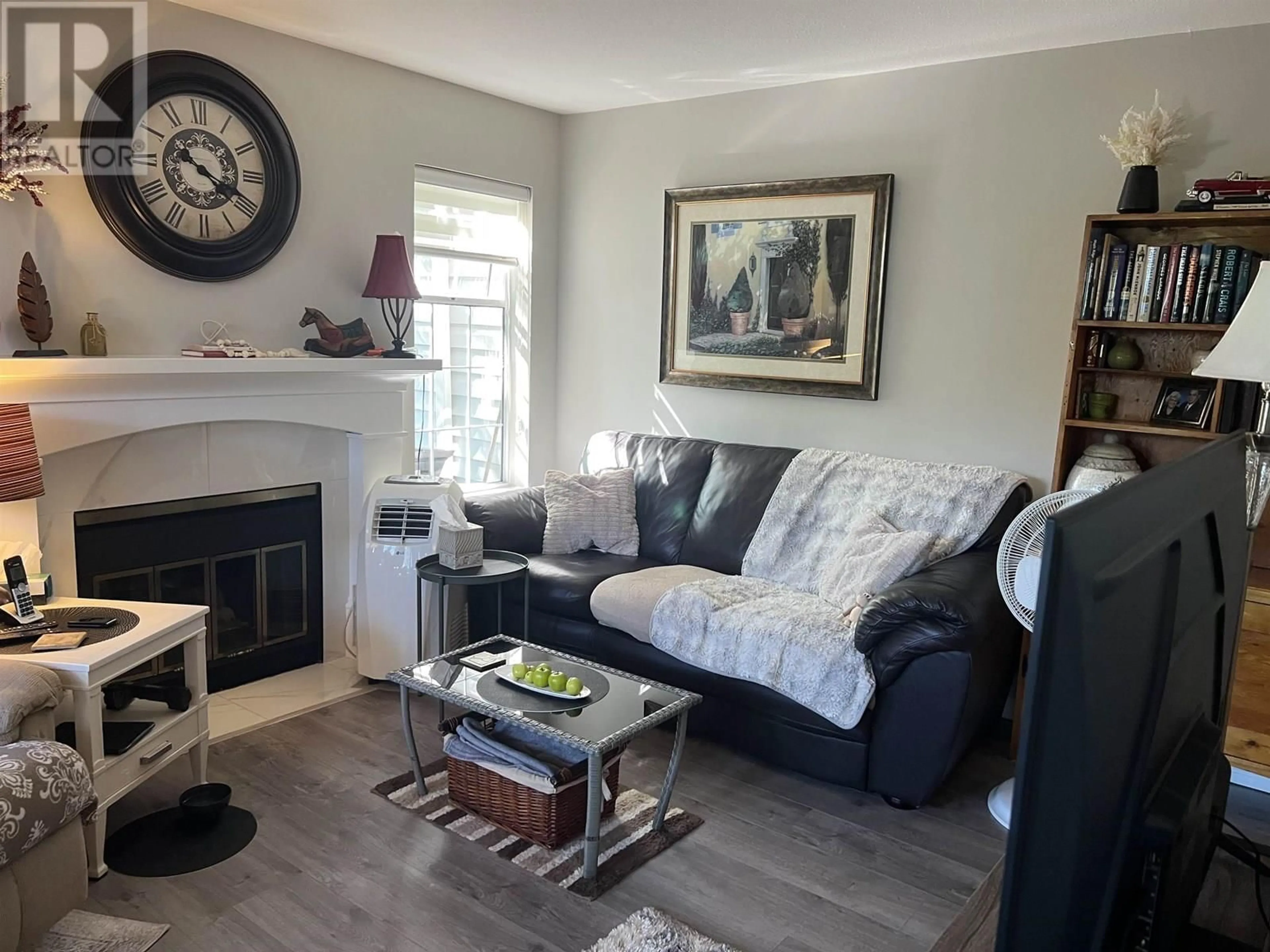 Living room with furniture, wood/laminate floor for 103 - 11578 225 STREET, Maple Ridge British Columbia V2X9W7