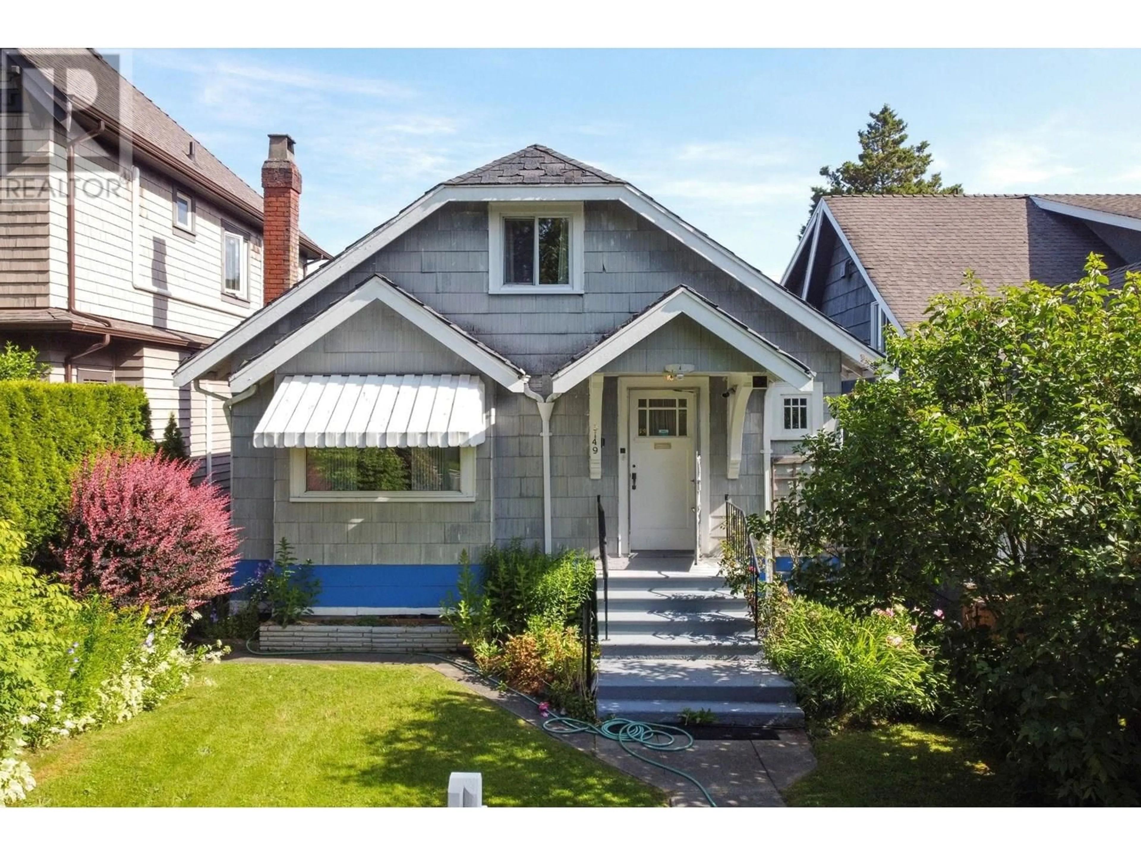 Home with vinyl exterior material, street for 3149 KING EDWARD AVENUE, Vancouver British Columbia V6L1V4