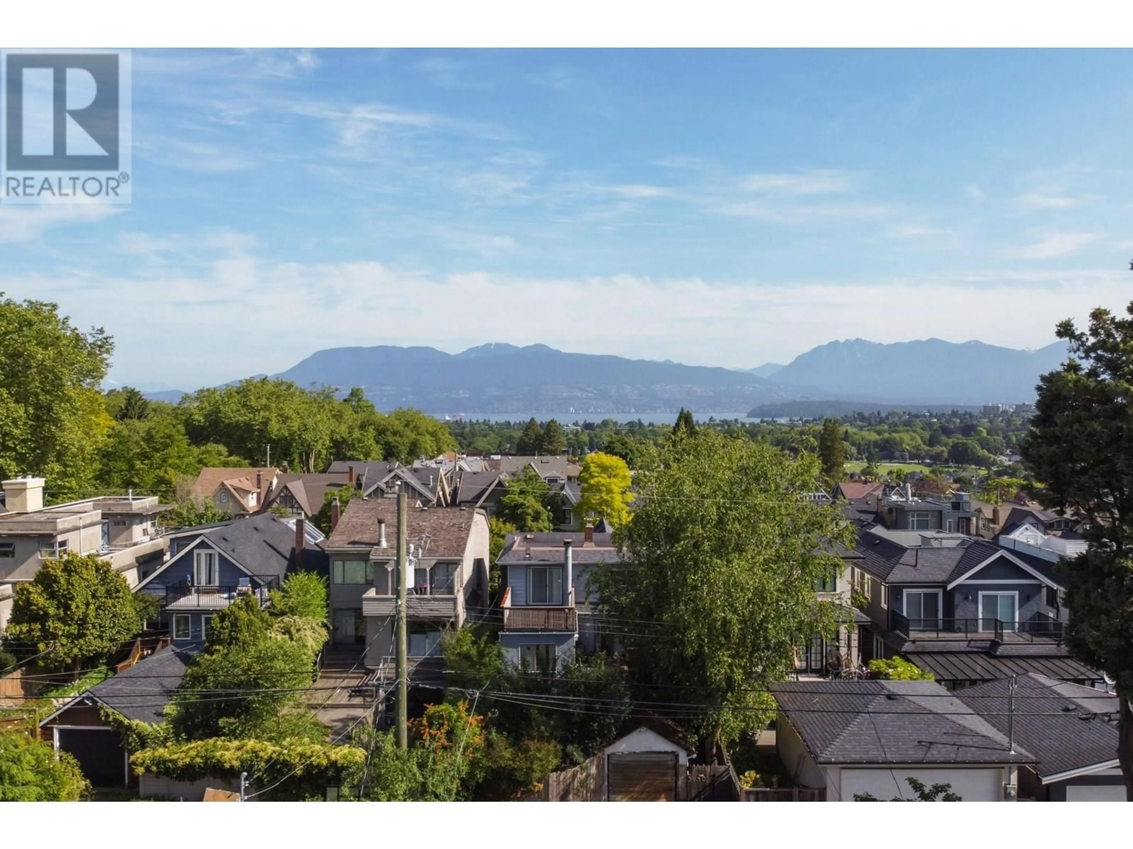 A pic from outside/outdoor area/front of a property/back of a property/a pic from drone, mountain view for 3149 KING EDWARD AVENUE, Vancouver British Columbia V6L1V4
