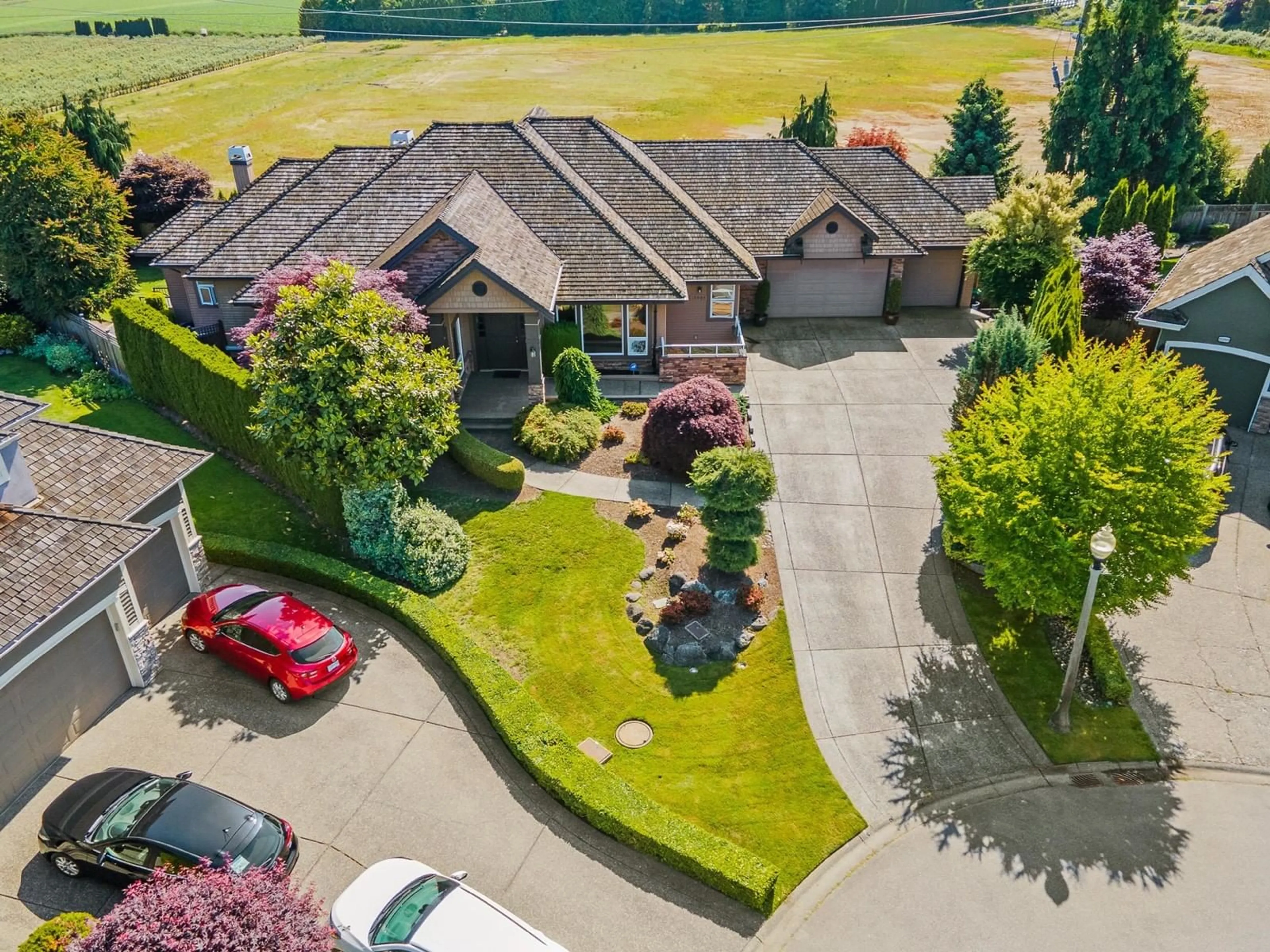 A pic from outside/outdoor area/front of a property/back of a property/a pic from drone, street for 15995 36A, Surrey British Columbia V3S0P1