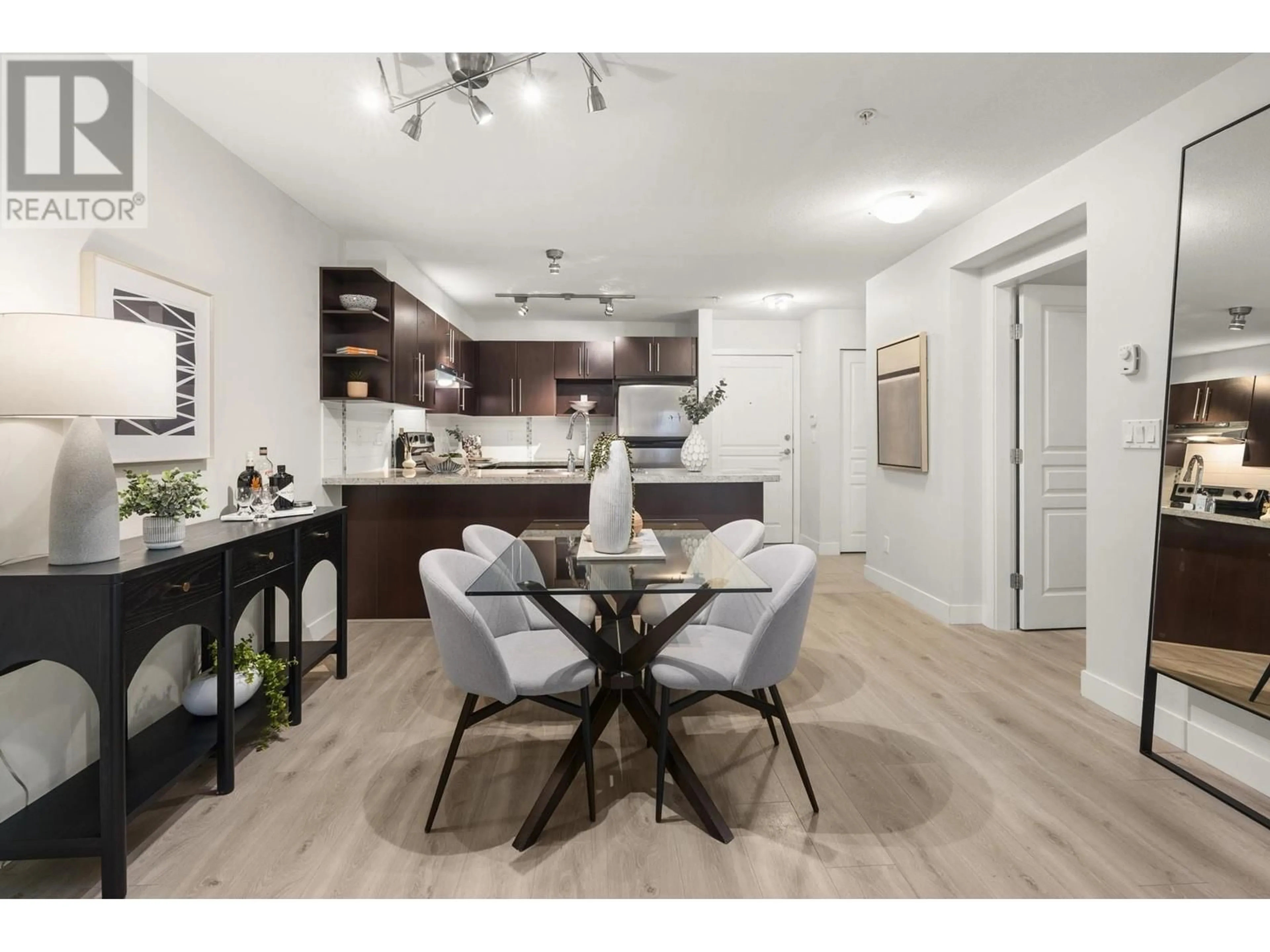 Open concept kitchen, wood/laminate floor for 109 - 2088 BETA AVENUE, Burnaby British Columbia V5C0C8