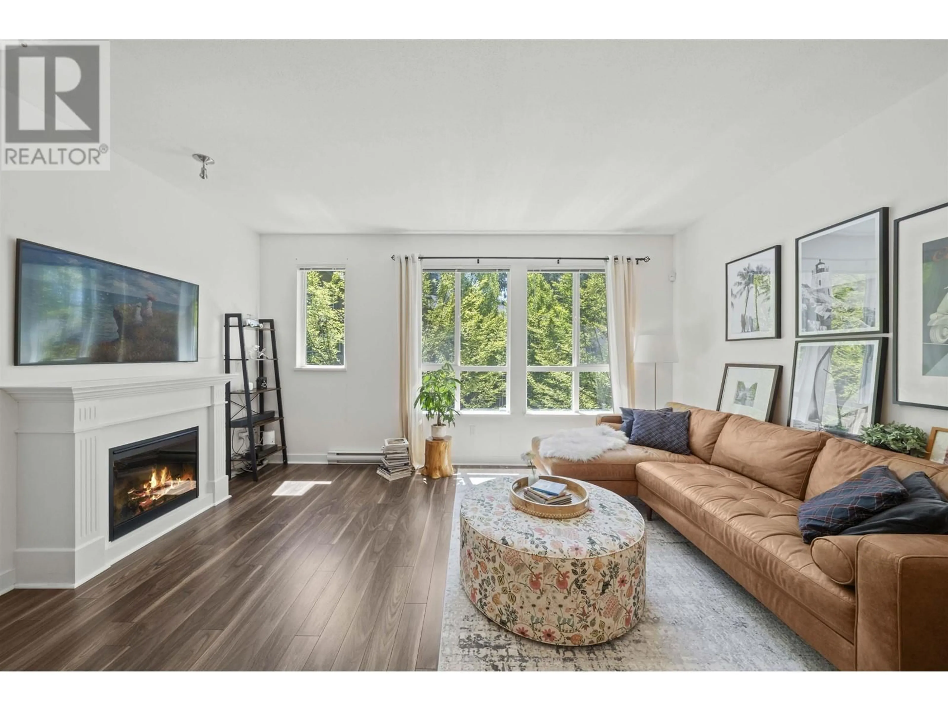 Living room with furniture, wood/laminate floor for 108 - 1480 SOUTHVIEW STREET, Coquitlam British Columbia V3E0G5
