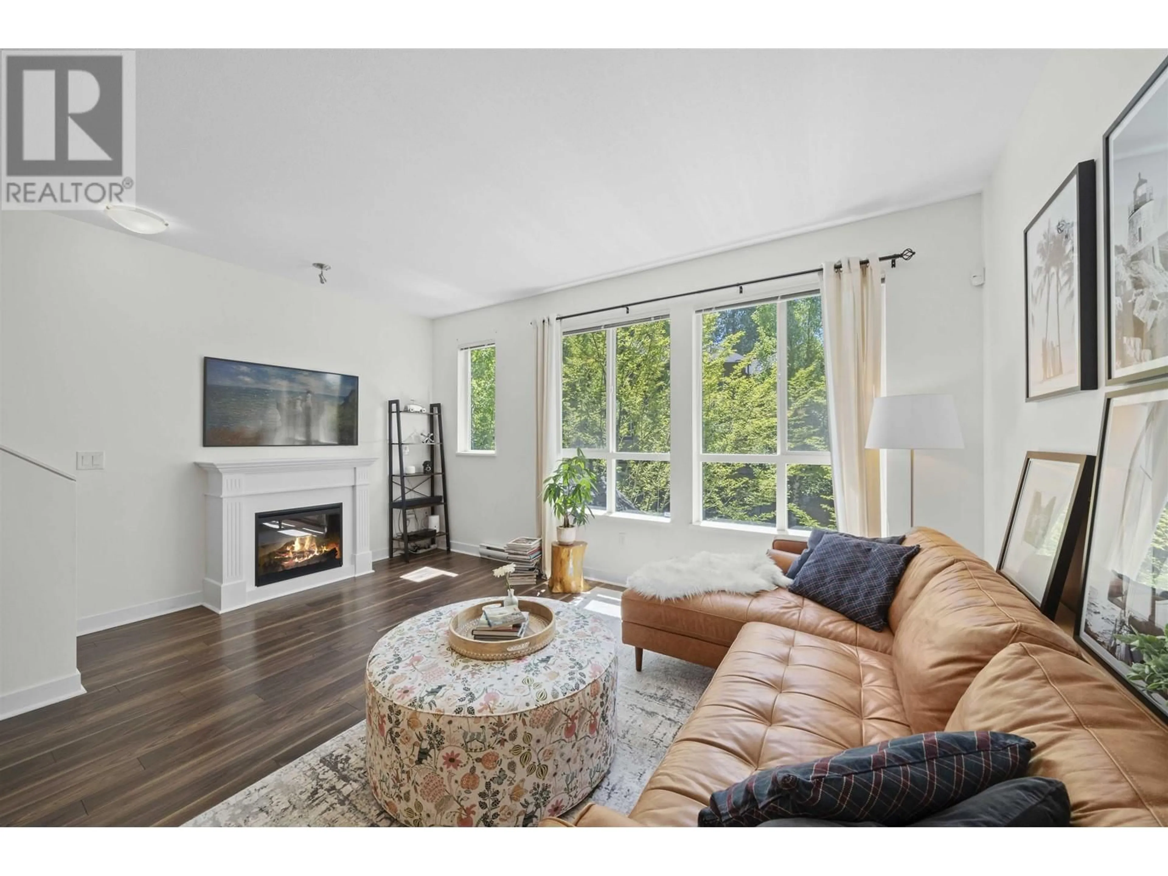Living room with furniture, wood/laminate floor for 108 - 1480 SOUTHVIEW STREET, Coquitlam British Columbia V3E0G5