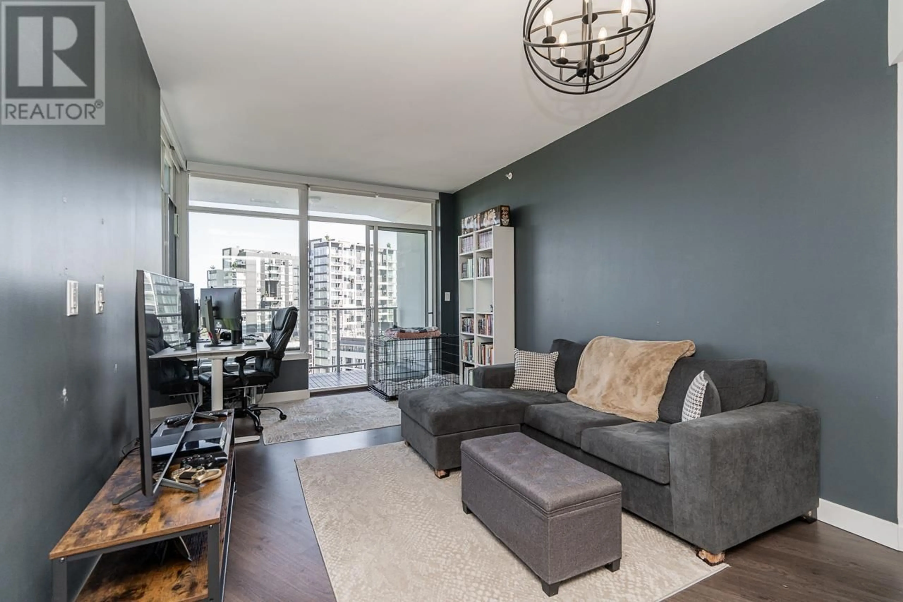 Living room with furniture, unknown for 1011 - 3557 SAWMILL CRESCENT, Vancouver British Columbia V5S0E2