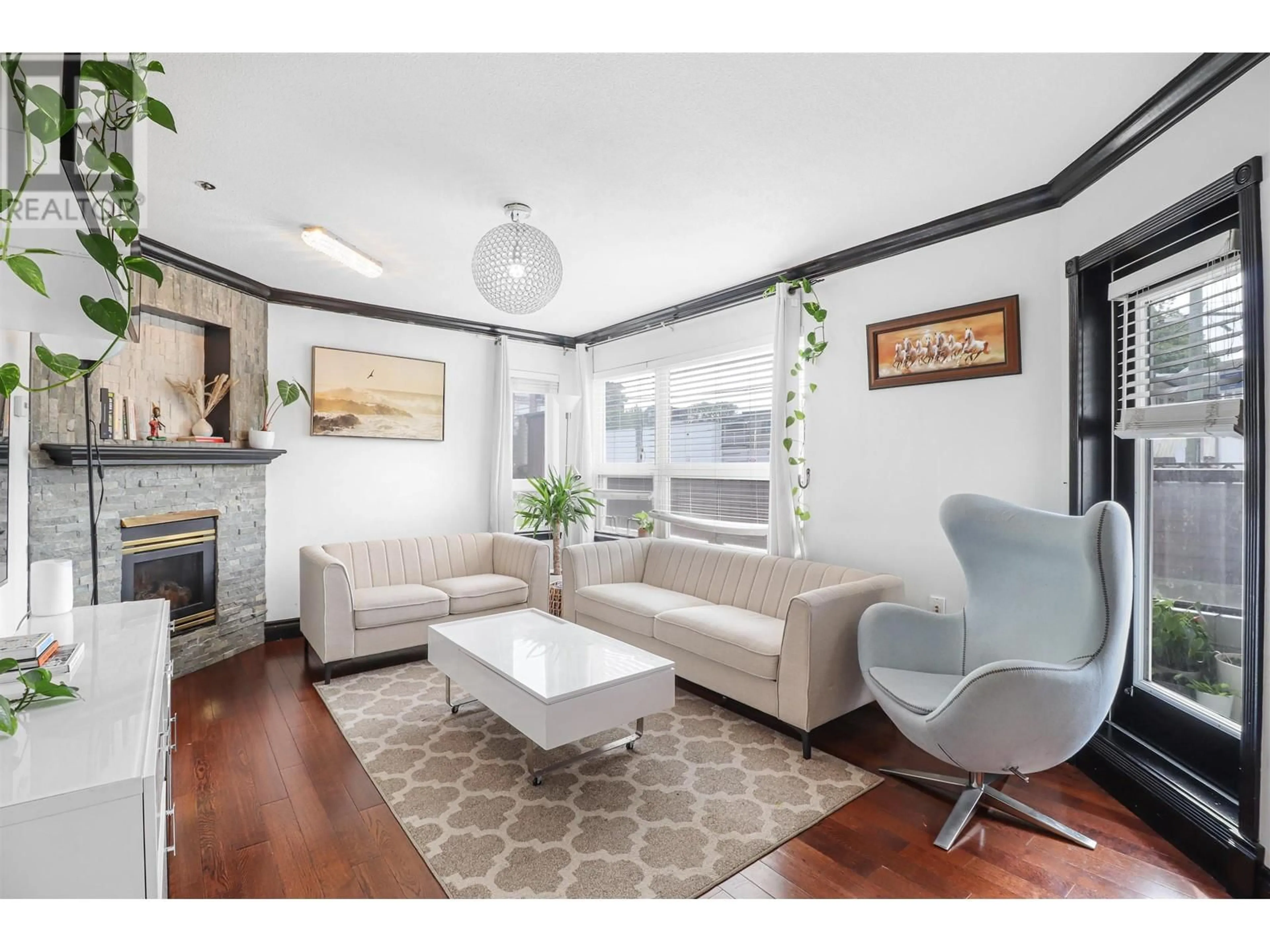 Living room with furniture, unknown for 106 - 2335 WHYTE AVENUE, Port Coquitlam British Columbia V3C2A3
