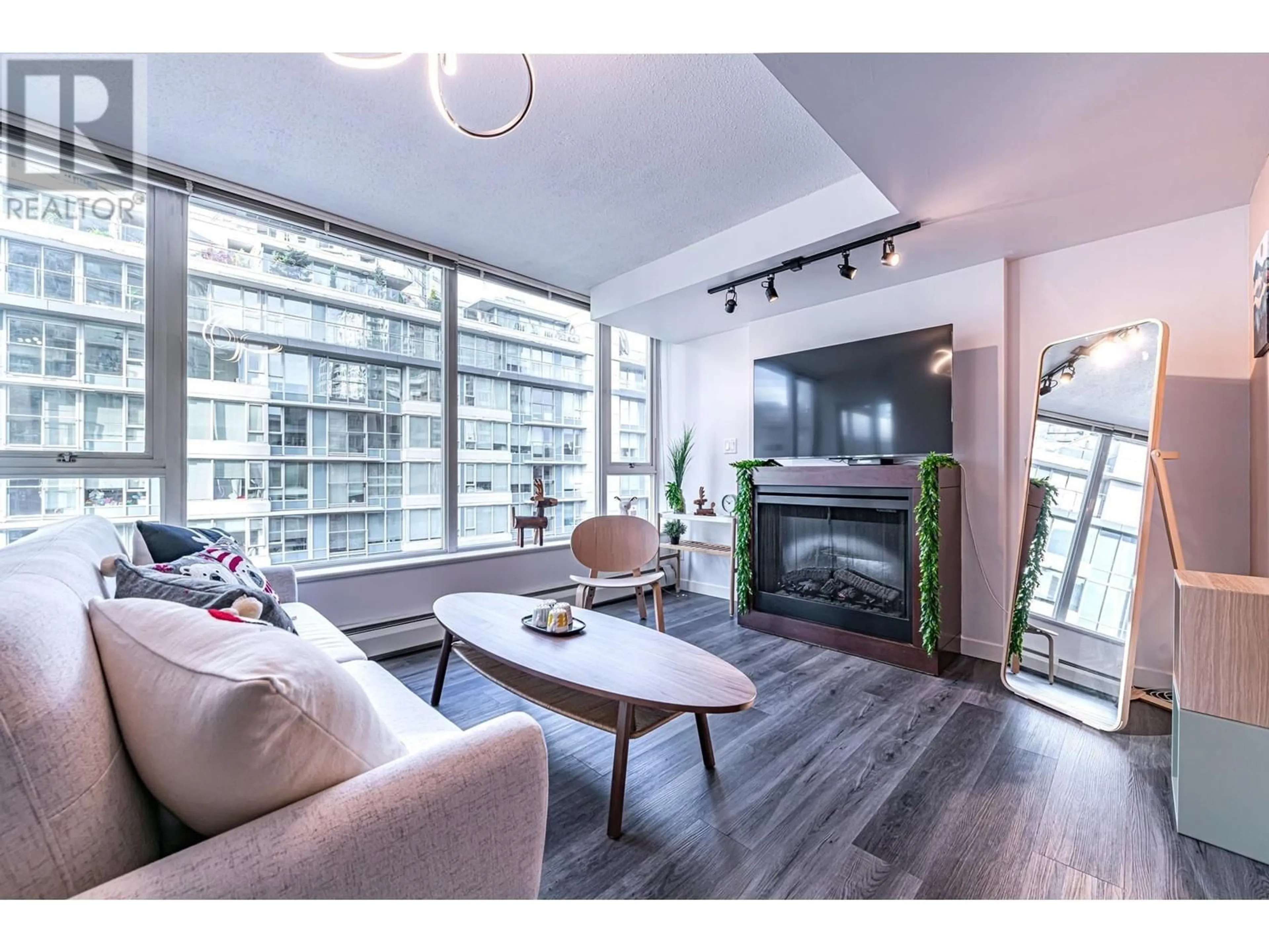 Living room with furniture, wood/laminate floor for 607 - 618 ABBOTT STREET, Vancouver British Columbia V6B0C1