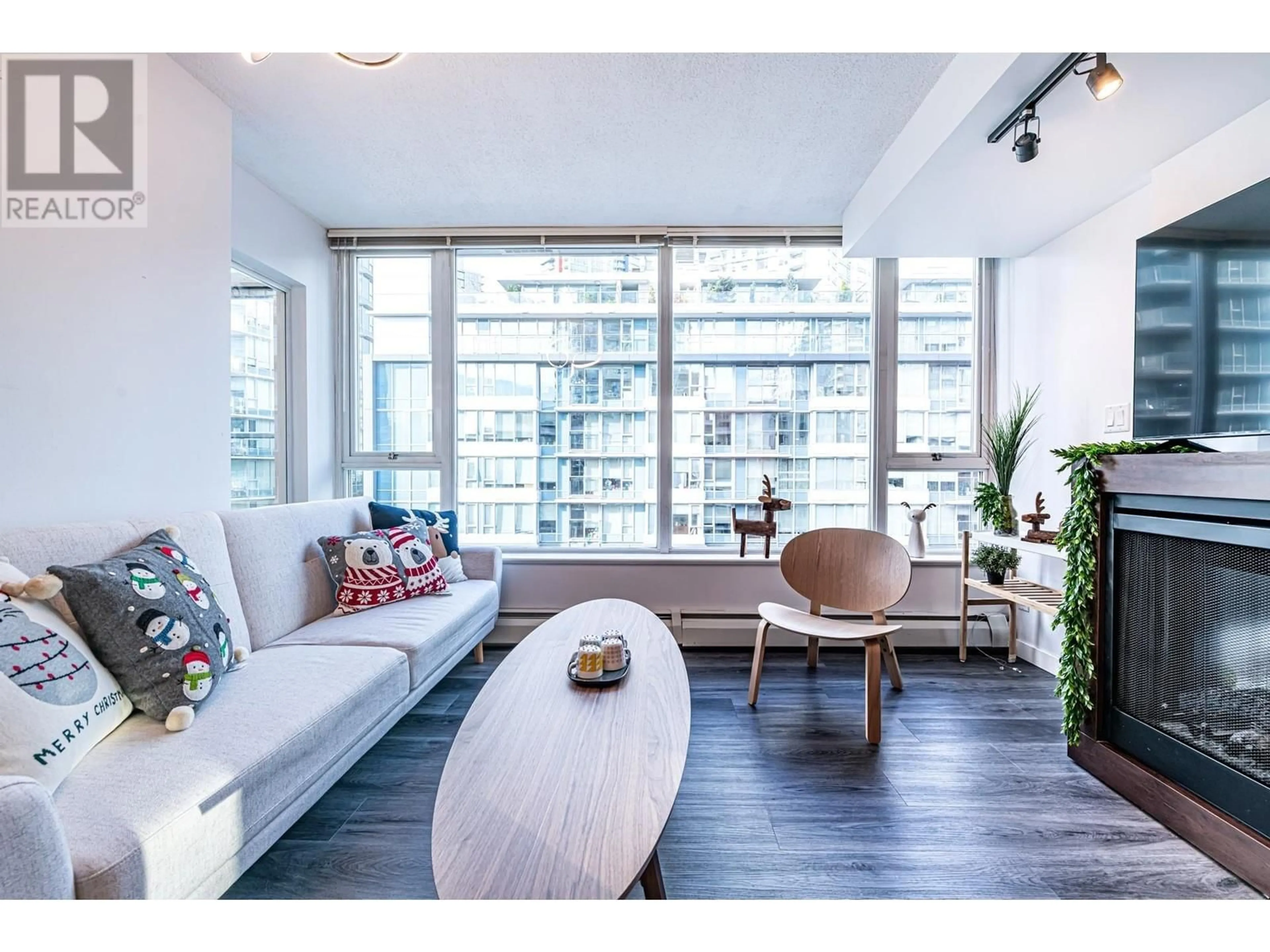 Living room with furniture, wood/laminate floor for 607 - 618 ABBOTT STREET, Vancouver British Columbia V6B0C1